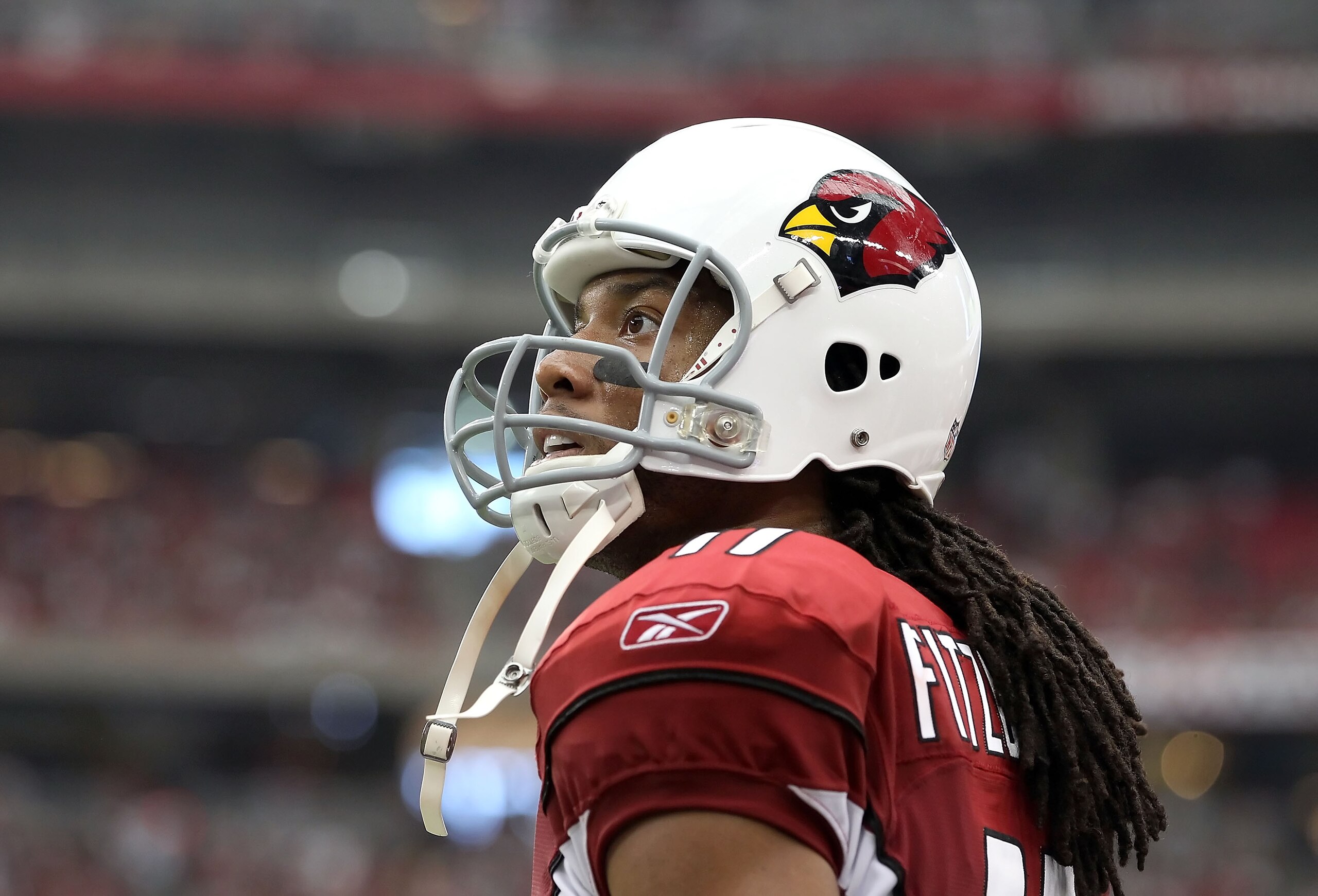 GLENDALE, AZ - SEPTEMBER 26:  Wide receiver Larry Fitzgerald #11 of the Arizona Cardinals during the NFL game against the Oakland Raiders at the University of Phoenix Stadium on September 26, 2010 in Glendale, Arizona.  The Cardinals defeated the Raiders