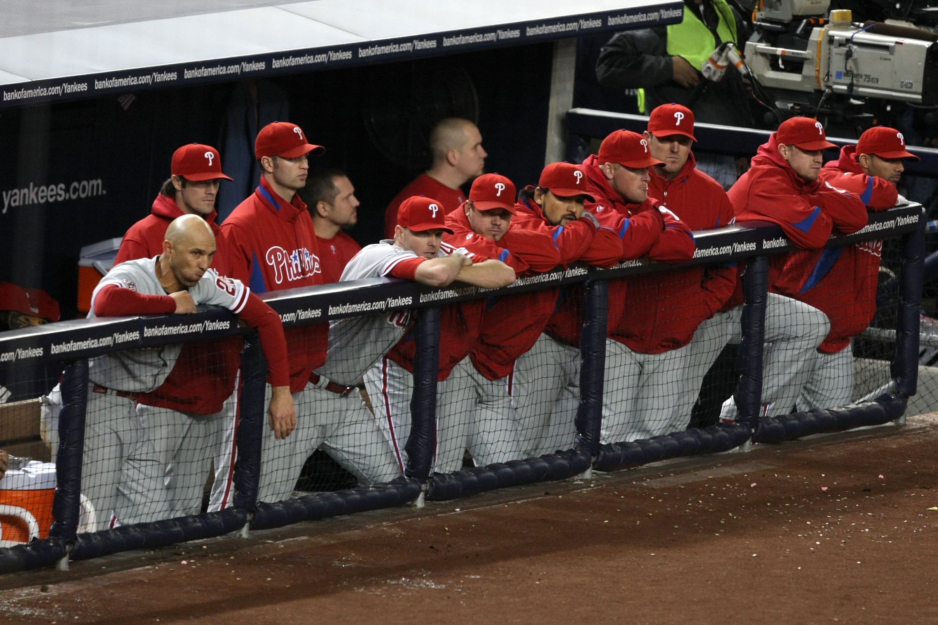 NEW YORK - NOVEMBER 04:   The Philadelphia Phillies stand dejected in the dugout late in the game against the New York Yankees in Game Six of the 2009 MLB World Series at Yankee Stadium on November 4, 2009 in the Bronx borough of New York City.  (Photo by