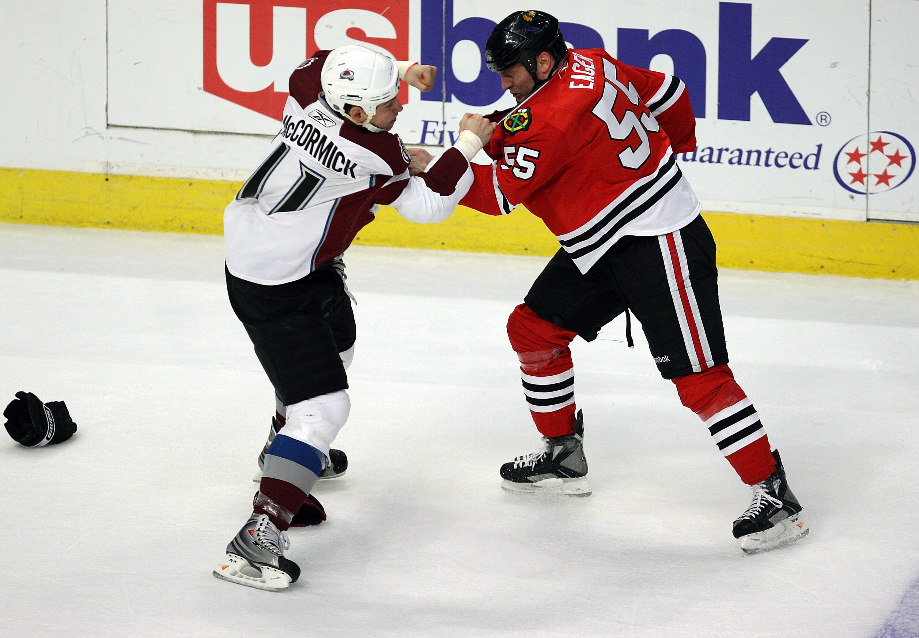 CHICAGO - MARCH 08:  Ben Eager #55 of the Chicago Blackhawks fights with Cody McCormick #11 of the Colorado Avalanche during the first period at the United Center on March 8, 2009 in Chicago, Illinois.  (Photo by Jonathan Daniel/Getty Images)