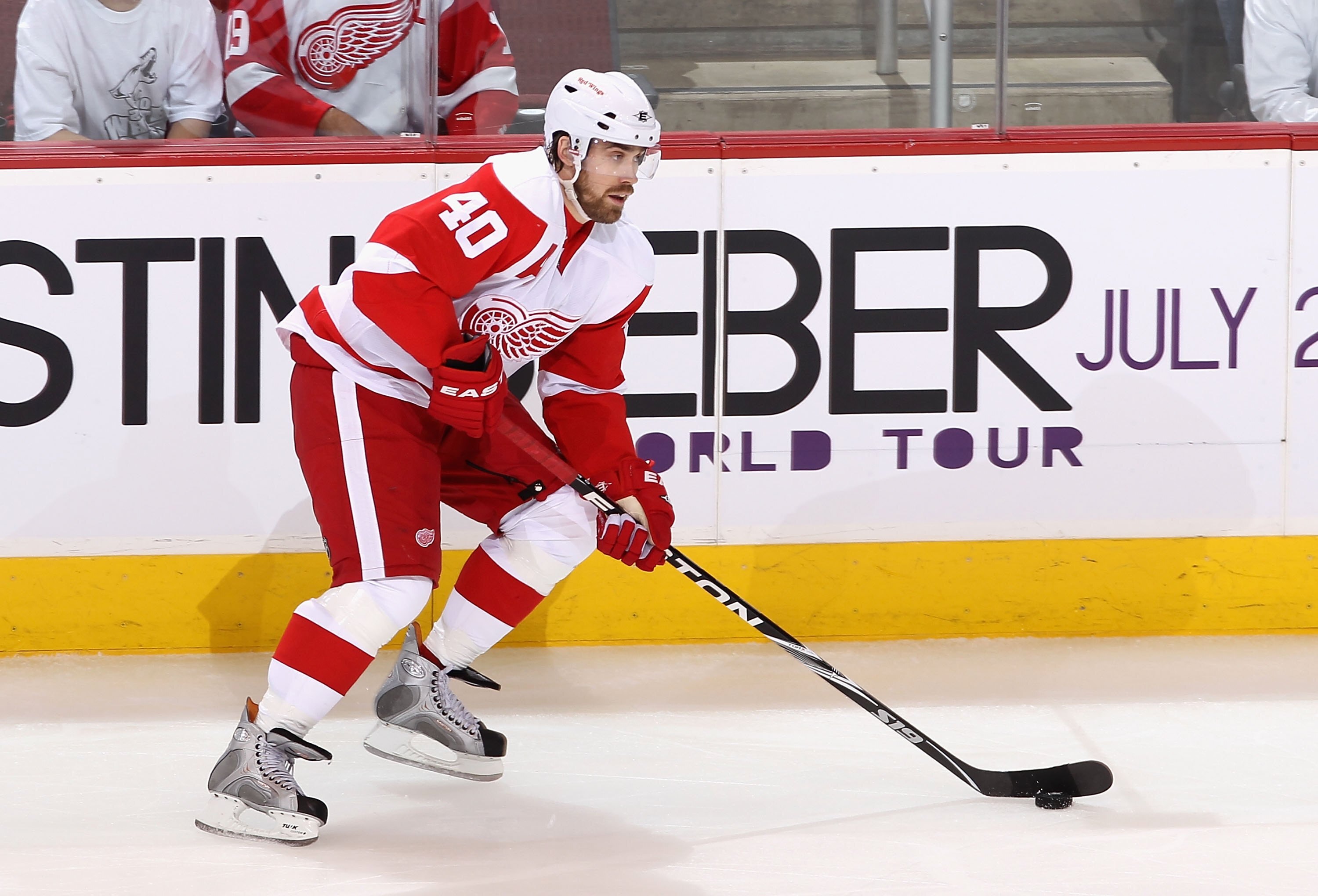 GLENDALE, AZ - APRIL 14:  Henrik Zetterberg #40 of the Detroit Red Wings skates with the puck in Game One of the Western Conference Quarterfinals against the Phoenix Coyotes during the 2010 NHL Stanley Cup Playoffs at Jobing.com Arena on April 14, 2010 in