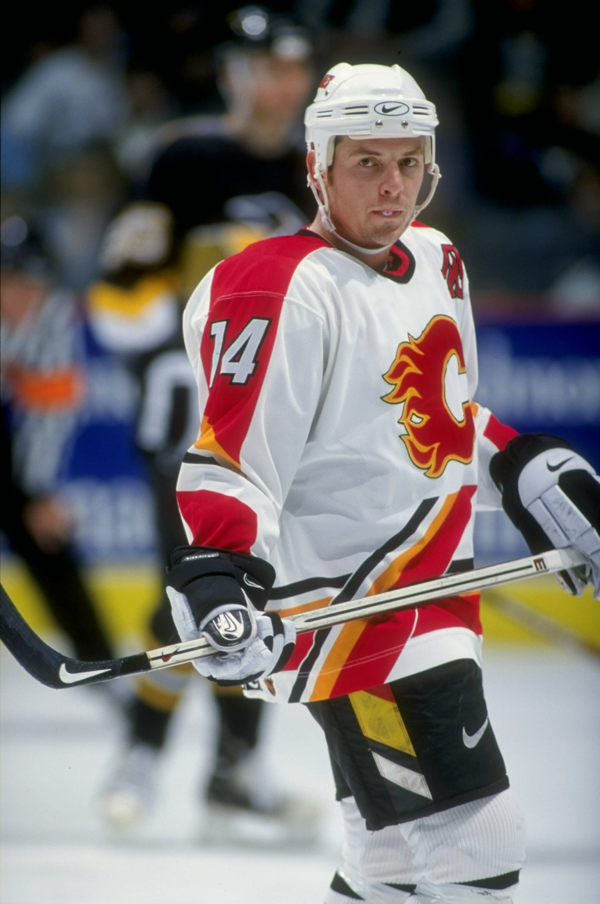 28 Oct 1998:   Rightwinger Theoren Fleury #14 of the Calgary Flames looks on during the game against the Pittsburgh Penguins at the Canadien Airlines Saddledome in Calgary, Alberta, Canada. The Penguins defeated the Flames 5-2. Mandatory Credit: Ian Tomli