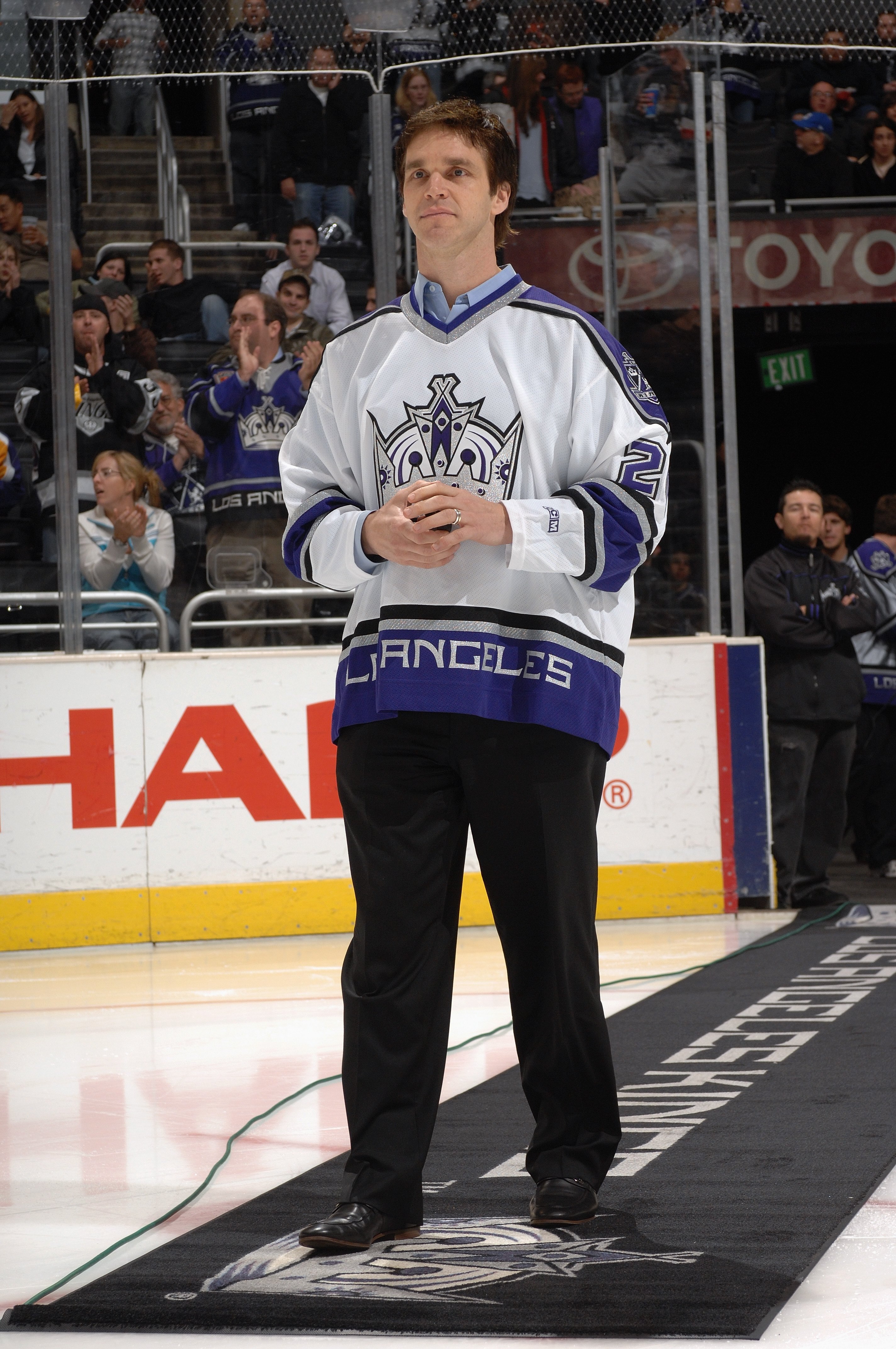LOS ANGELES - MARCH 21:  Former Los Angeles Kings player Luc Robitaille walks out to center ice for the ceremonial face off before the game against the Dallas Stars on March 21, 2007 at Staples Center in Los Angeles, California. The Stars won 4-2. (Photo 