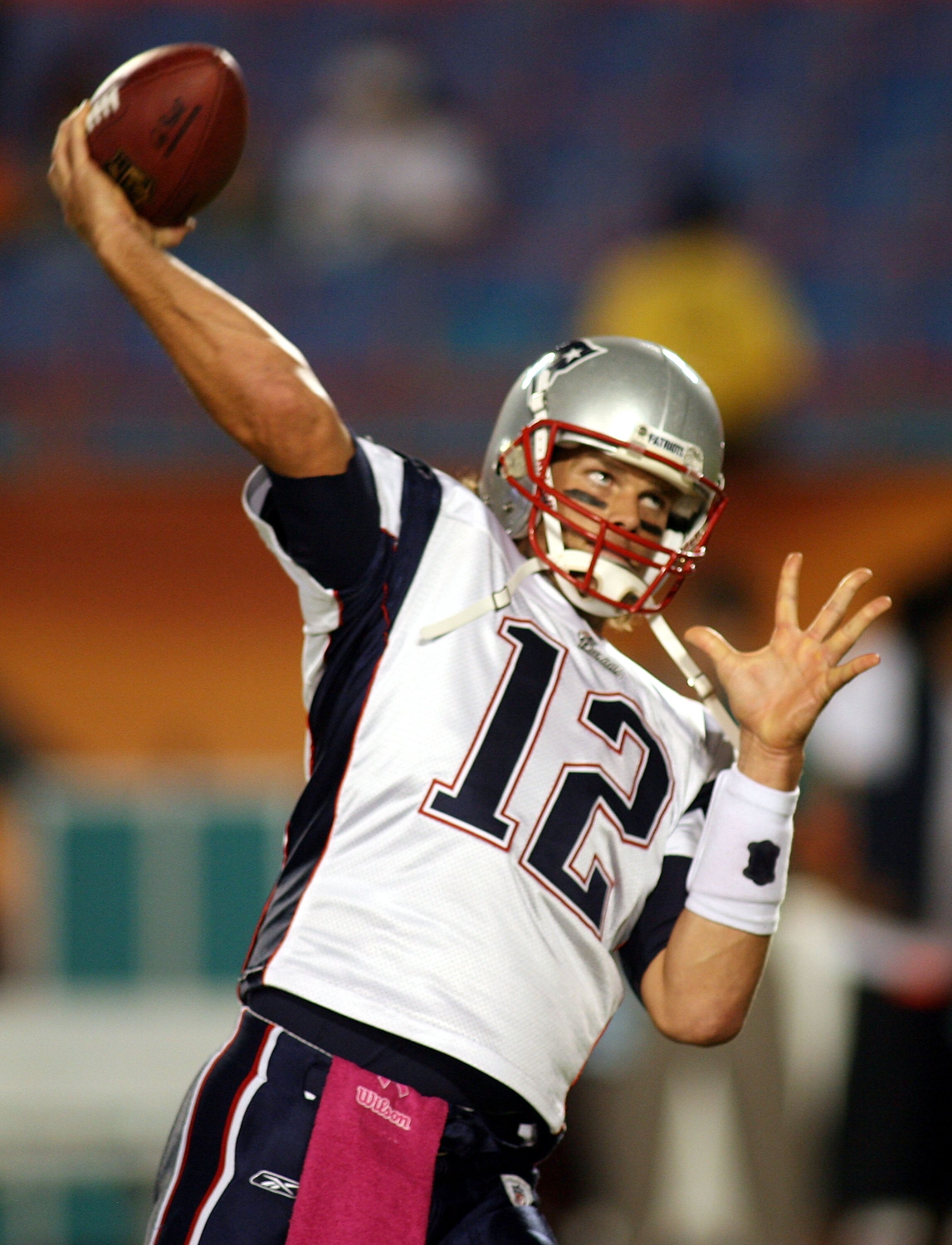 MIAMI - OCTOBER 04:  Quarterback Tom Brady #12 of the New England Patriots warms up against the Miami Dolphins at Sun Life Stadium on October 4, 2010 in Miami, Florida.  (Photo by Marc Serota/Getty Images)