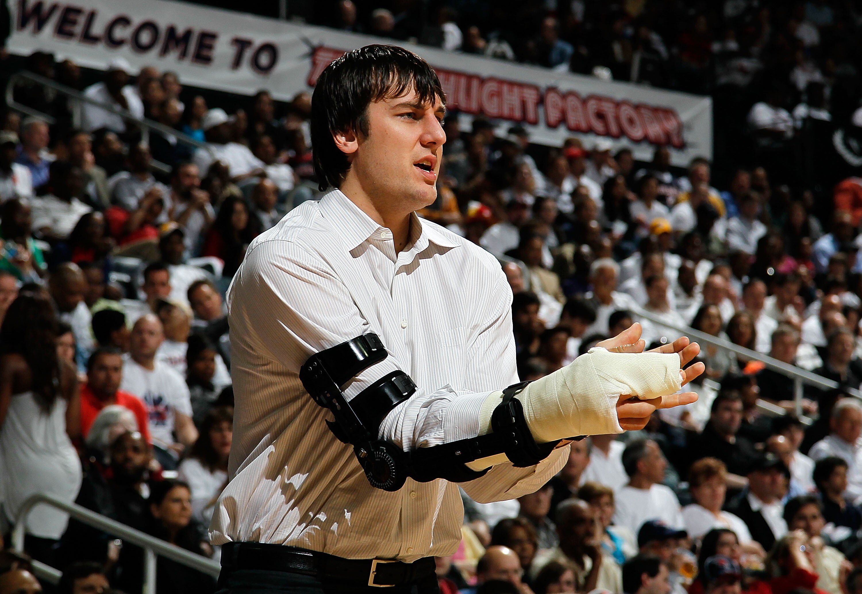 ATLANTA - APRIL 20:  Andrew Bogut #6 of the Milwaukee Bucks cheers on his team against the Atlanta Hawks at Philips Arena on April 20, 2010 in Atlanta, Georgia.  NOTE TO USER: User expressly acknowledges and agrees that, by downloading and/or using this P