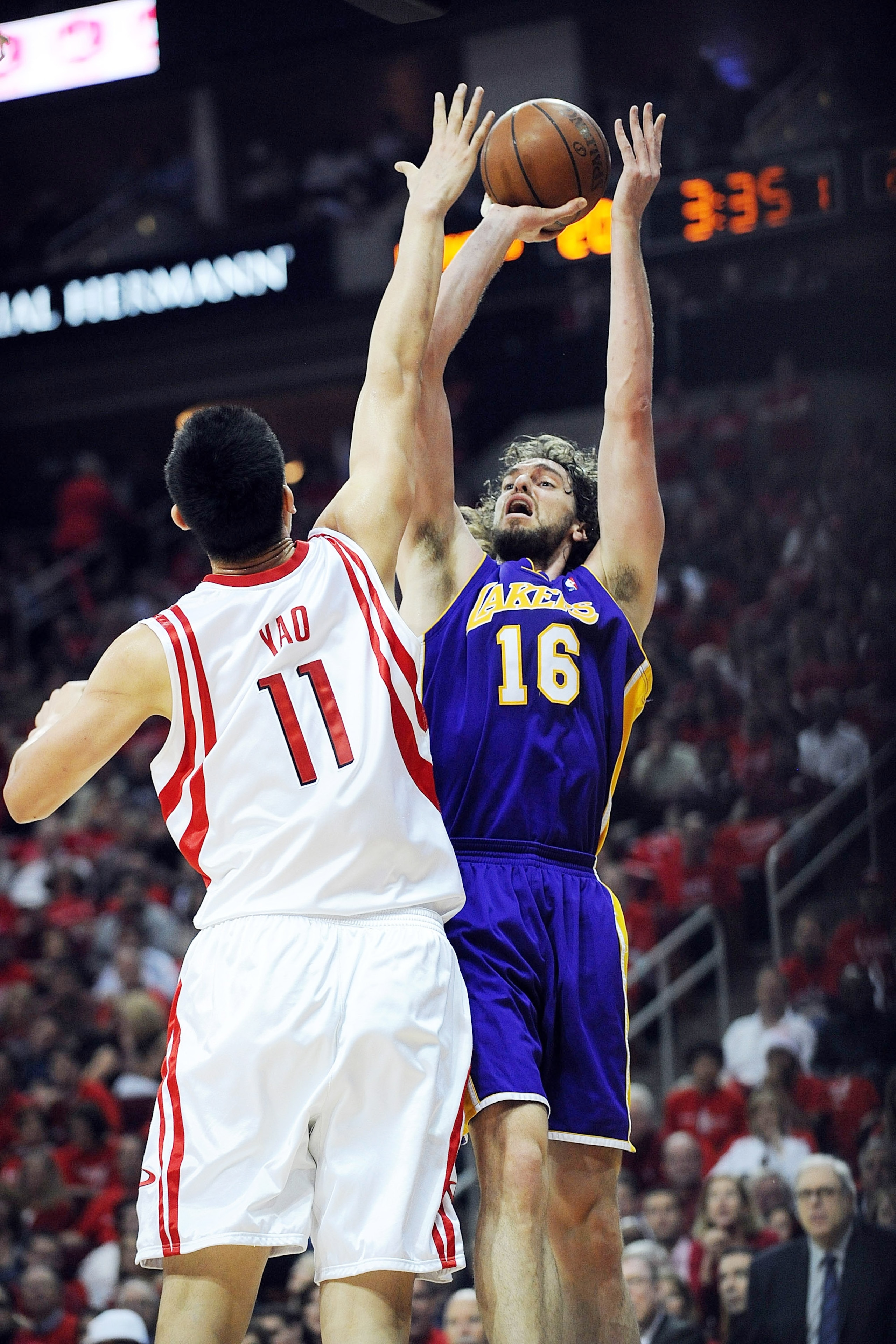 HOUSTON - MAY 08: Forward Pau Gasol #16 of the Los Angeles Lakers takes a shot against Yao Ming #11 of the Houston Rockets in Game Three of the Western Conference Semifinals during the 2009 NBA Playoffs at Toyota Center on May 8, 2009 in Houston, Texas. HOUSTON - MAY 08: Forward Pau Gasol #16 of the Los Angeles Lakers takes a shot against Yao Ming #11 of the Houston Rockets in Game Three of the Western Conference Semifinals during the 2009 NBA Playoffs at Toyota Center on May 8, 2009 in Houston, Texas.