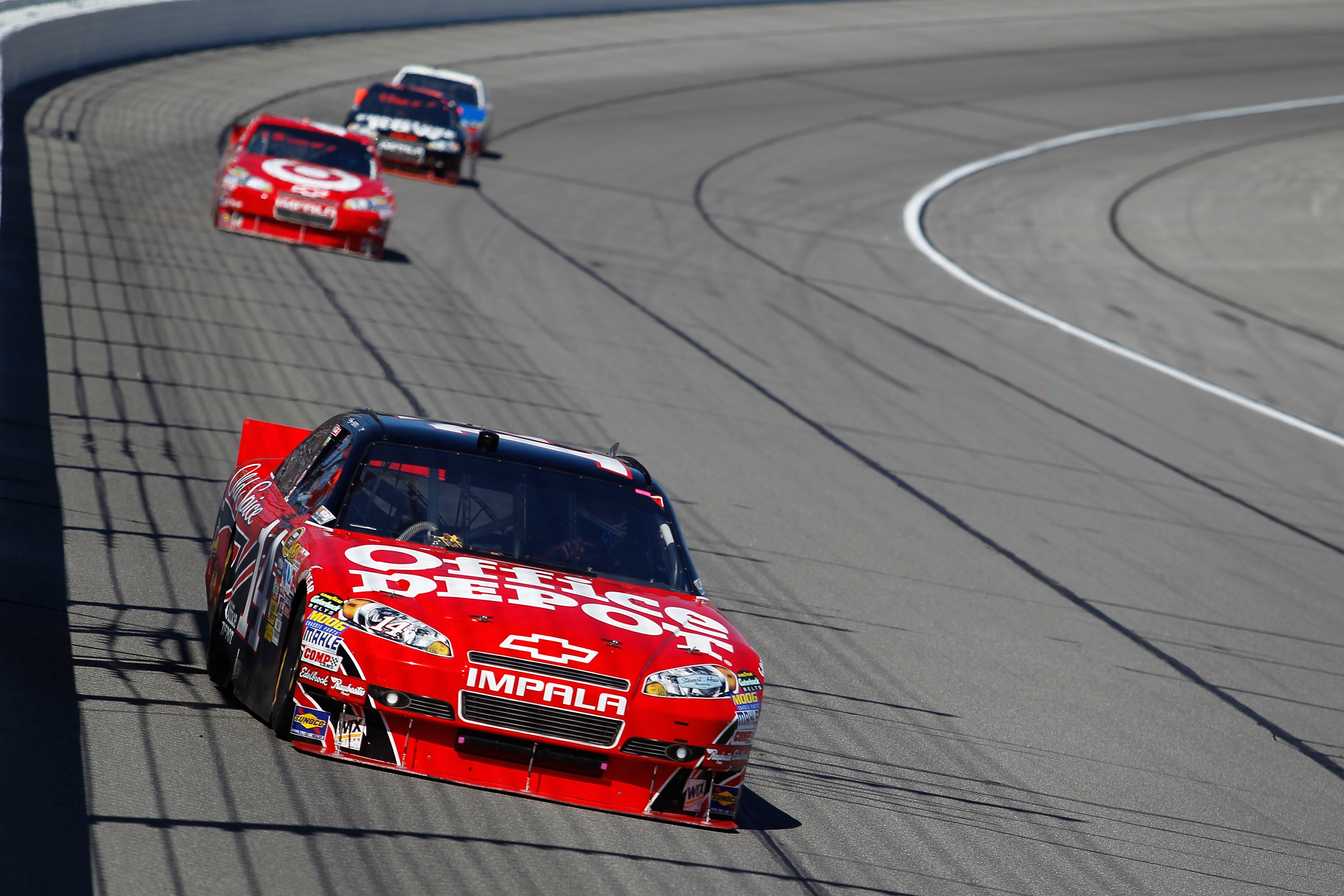 KANSAS CITY, KS - OCTOBER 03:  Tony Stewart, driver of the #14 Office Depot Chevrolet, leads a line of cars during the NASCAR Sprint Cup Series Price Chopper 400 on October 3, 2010 in Kansas City, Kansas.  (Photo by Todd Warshaw/Getty Images)