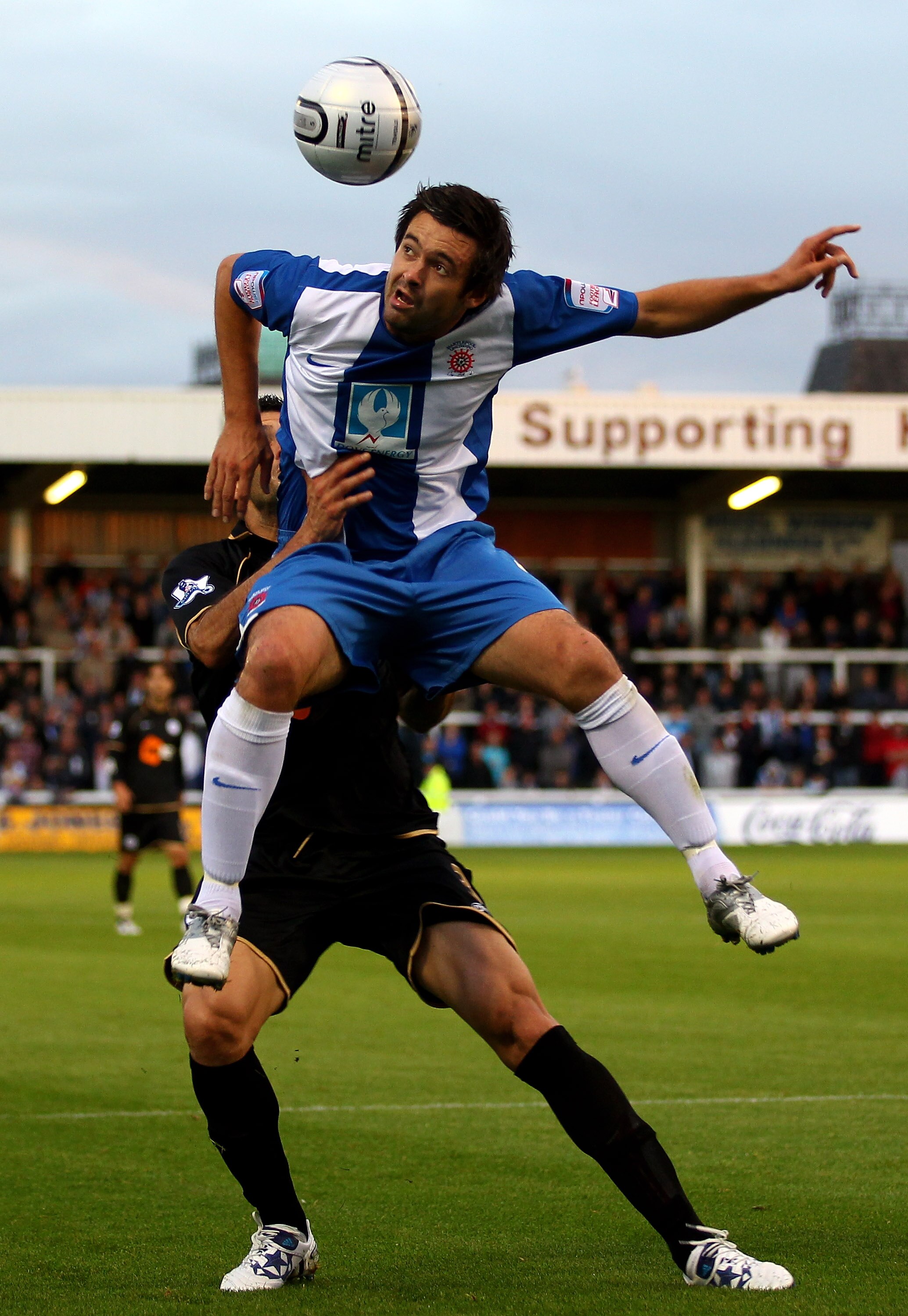 HARTLEPOOL, ENGLAND - AUGUST 24:  Adam Boyd of Hartlepool United rises above Antolin Alcaraz of Wigan Athletic during the Carling Cup second round match between Hartlepool United and Wigan Athletic at Victoria Park on August 24, 2010 in Hartlepool, Englan