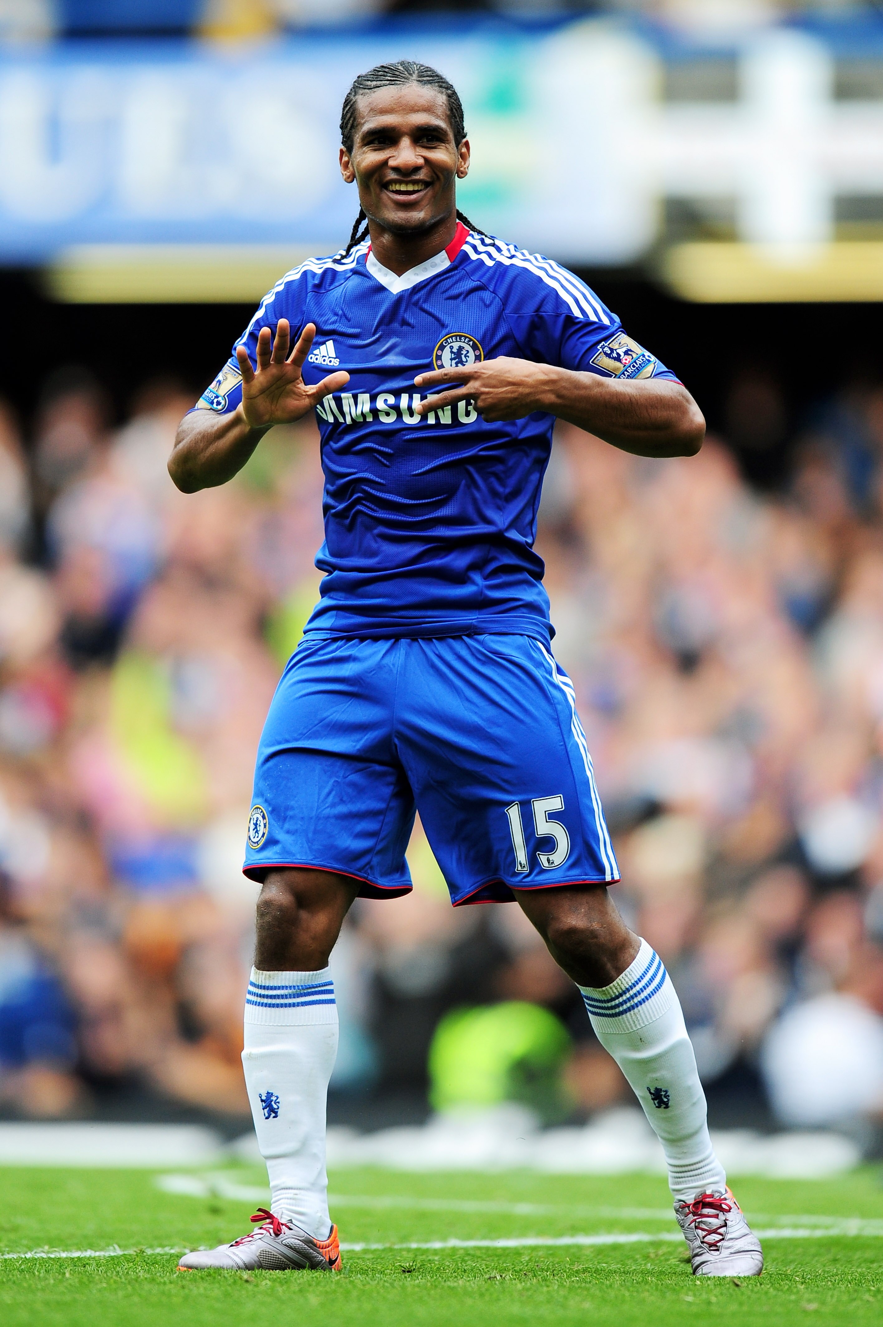 LONDON, ENGLAND - SEPTEMBER 19:  Florent Malouda of Chelsea celebrates after scoring his team's fourth goal during the Barclays Premier League match between Chelsea and Blackpool at Stamford Bridge on September 19, 2010 in London, England.  (Photo by Mike