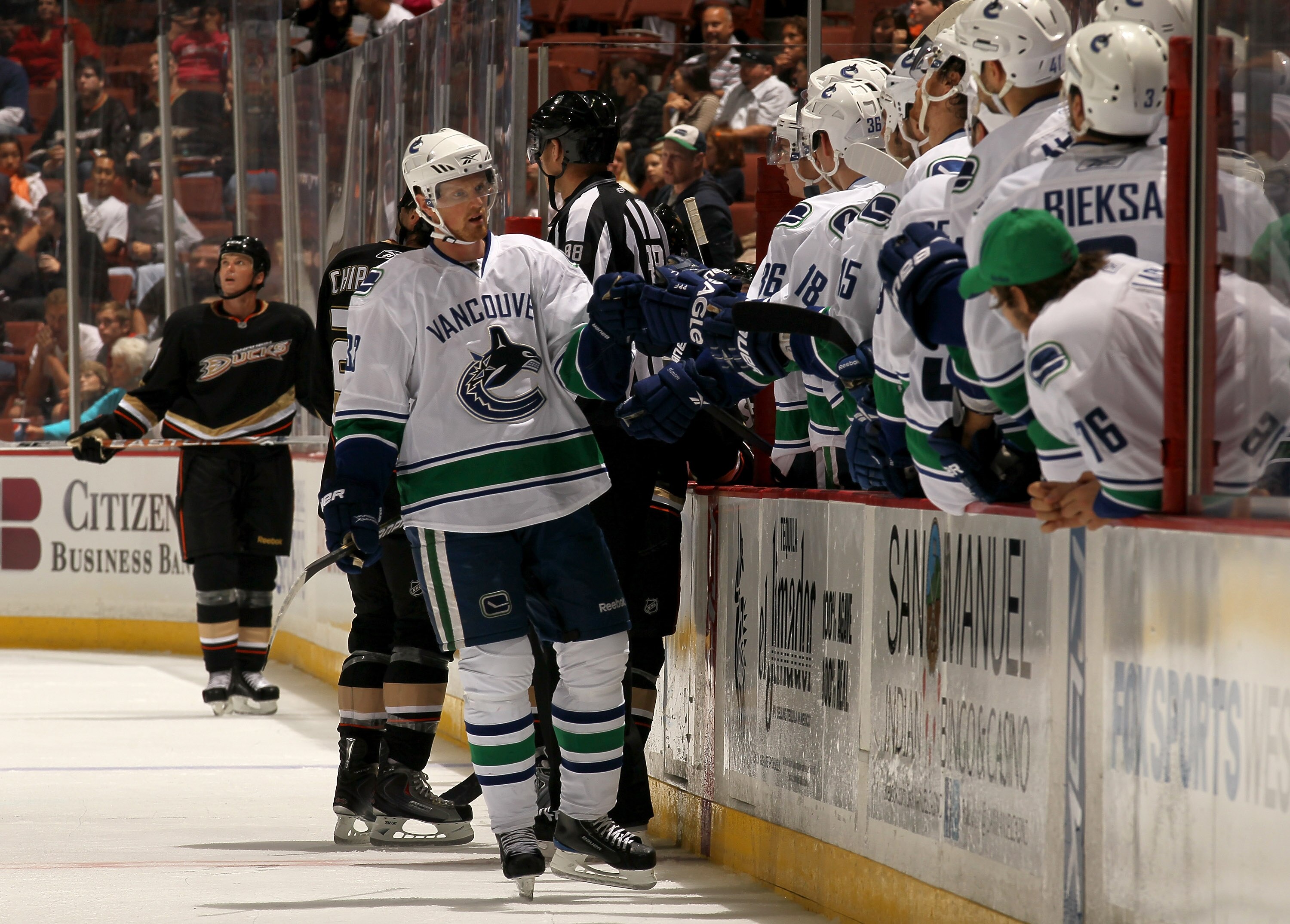 ANAHEIM, CA - OCTOBER 1:  Henrik Sedin #33 of the Vancouver Canucks  skates by the bench after scoring the go ahead goal in the third period against the Anaheim Ducks at Honda Center on October 1, 2010 in Anaheim, California.  Vancouver won 4-2.  (Photo b