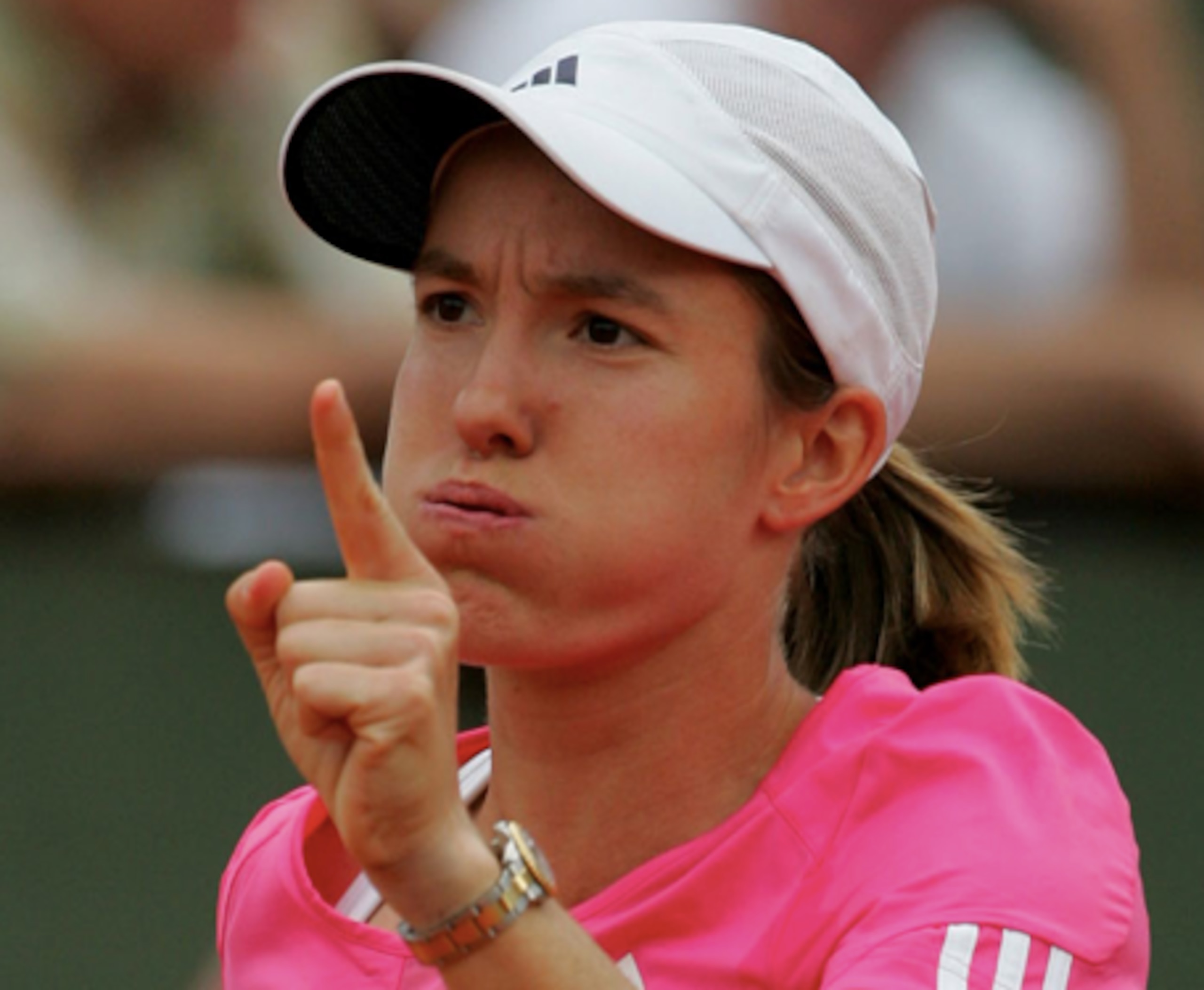 Justine Henin staved off Maria Sharapova 6-2 3-6 6-3.
