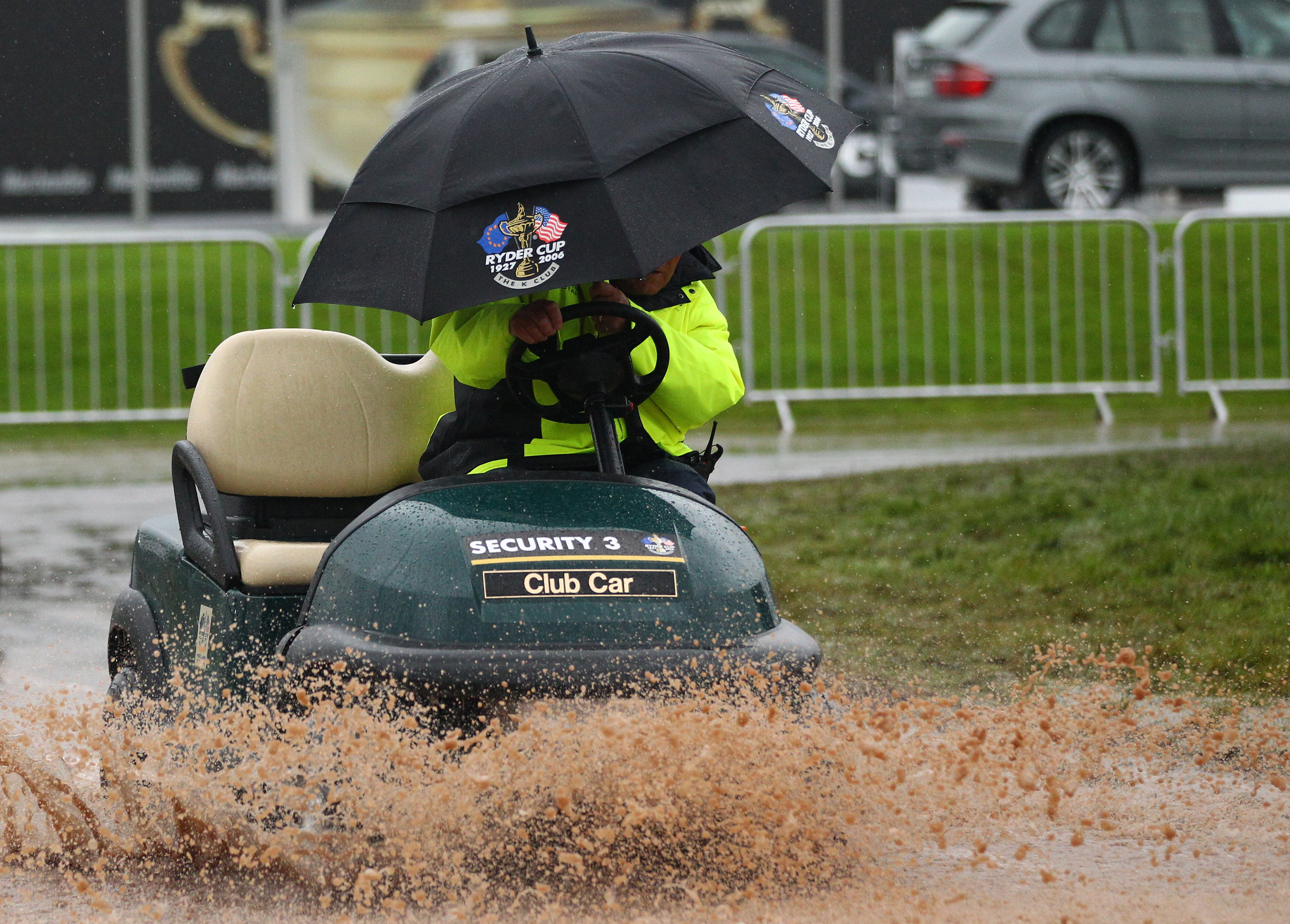 NEWPORT, WALES - OCTOBER 03:  Cart passes through the rain and mud during the weather delay prior to the restart of the Fourball & Foursome Matches during the 2010 Ryder Cup at the Celtic Manor Resort on October 3, 2010 in Newport, Wales.  (Photo by Richa