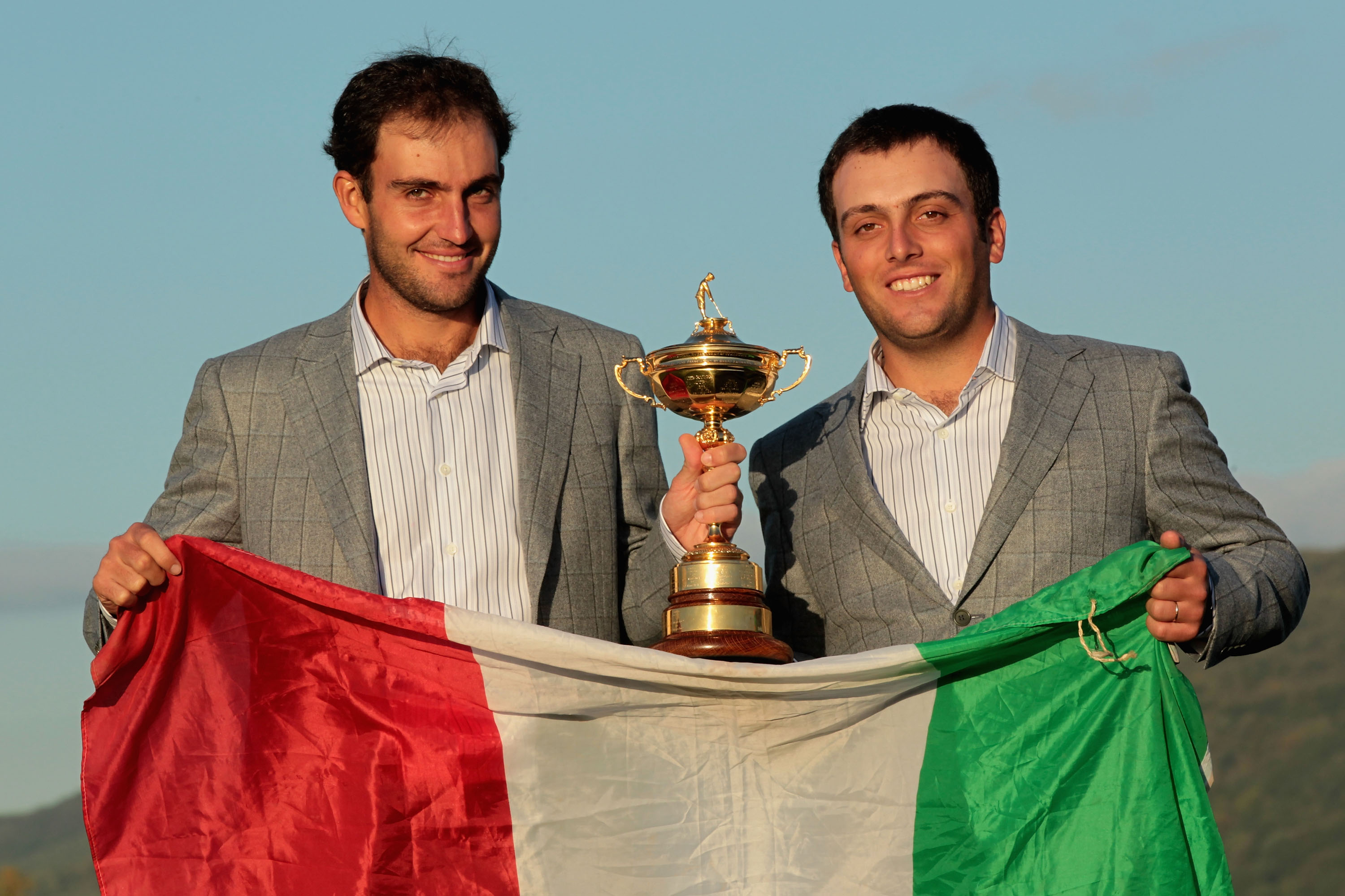 NEWPORT, WALES - OCTOBER 04:  (L-R) European Team members Edoardo and Francesco Molinari pose with the Ryder Cup following Europe's 14.5 to 13.5 victory over the USA at the 2010 Ryder Cup at the Celtic Manor Resort on October 4, 2010 in Newport, Wales.  (