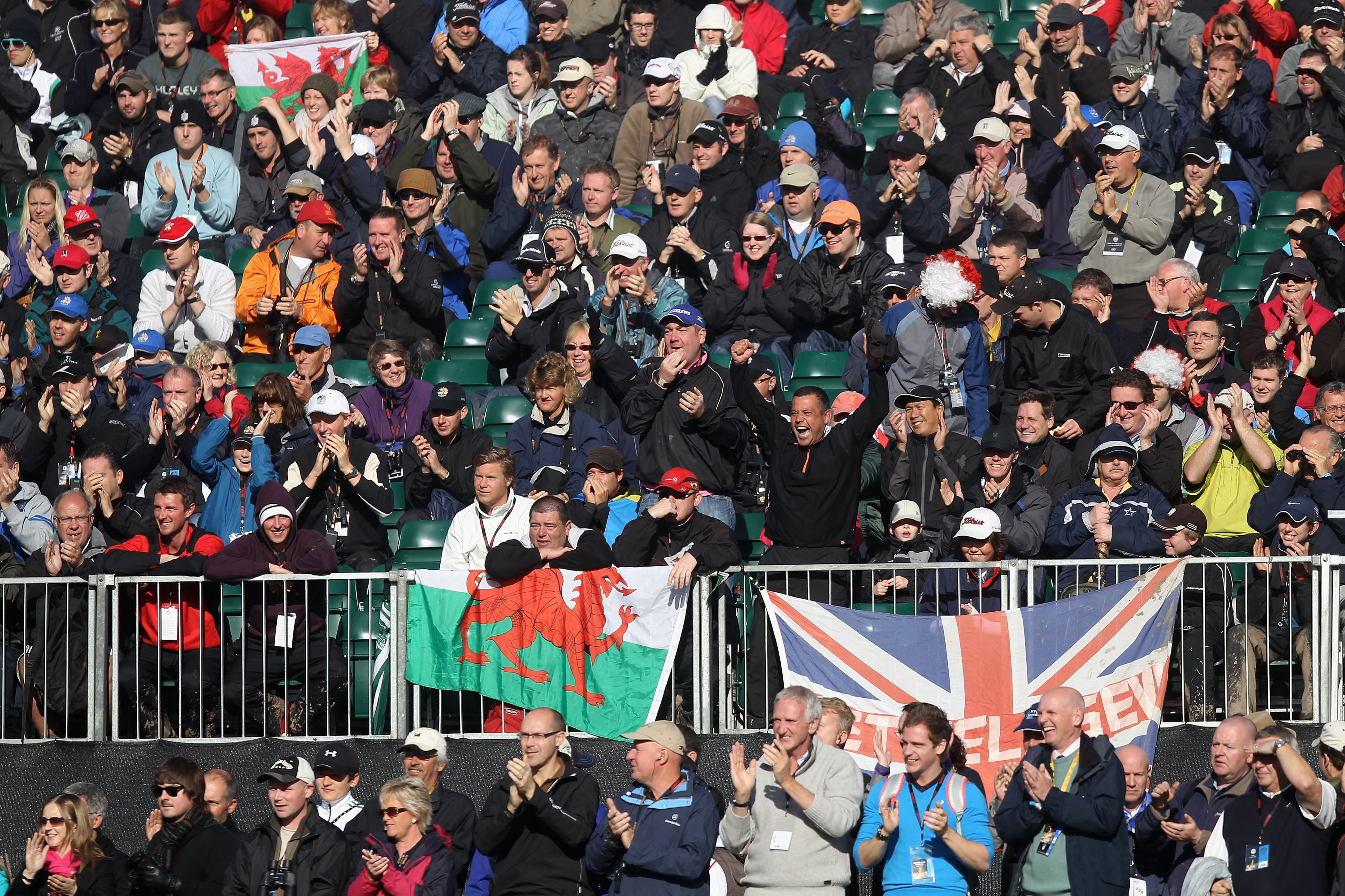 NEWPORT, WALES - OCTOBER 04:  Fans watch the play on the first tee during the singles matches during the 2010 Ryder Cup at the Celtic Manor Resort on October 4, 2010 in Newport, Wales.  (Photo by Ross Kinnaird/Getty Images)