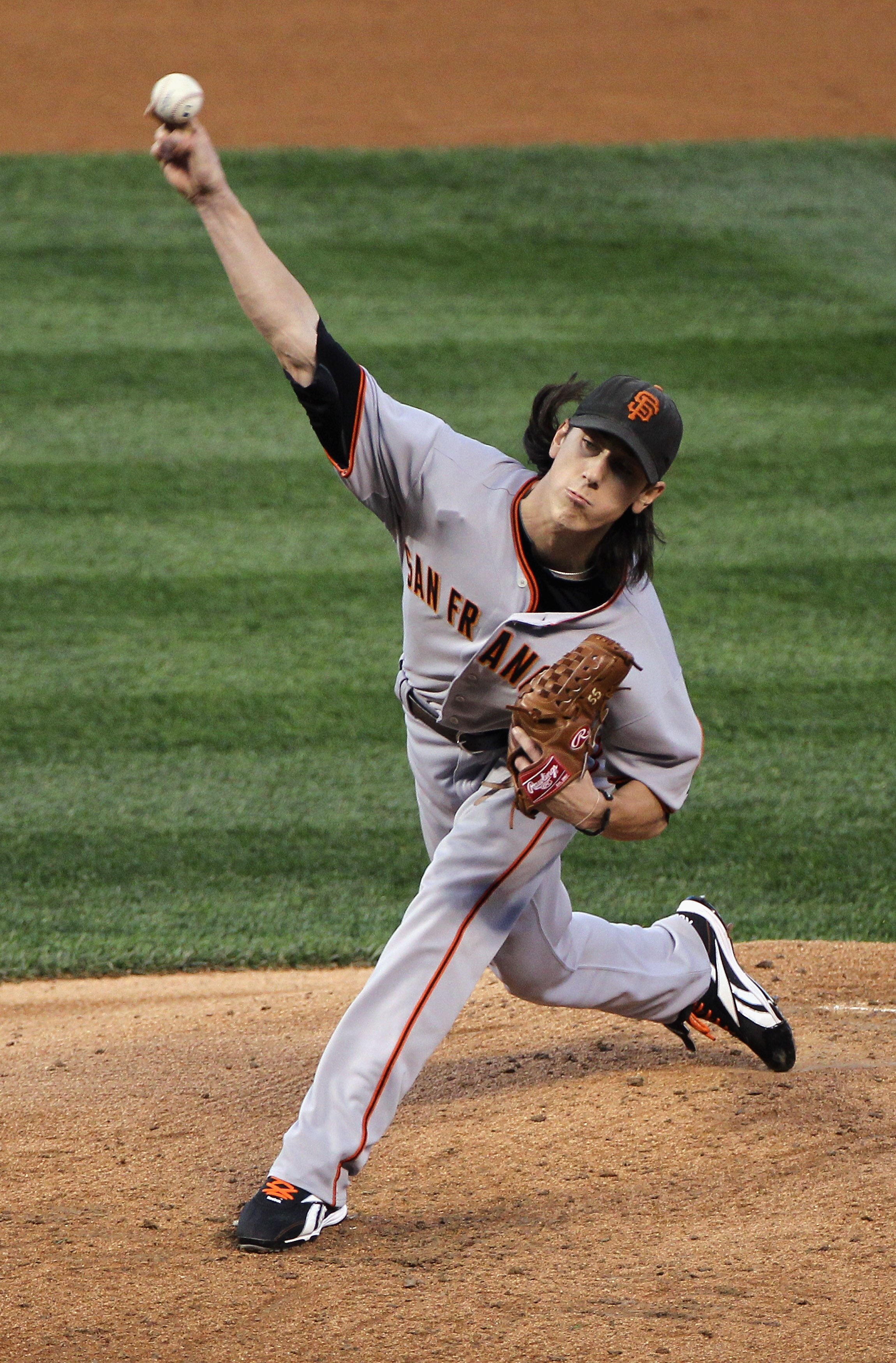 DENVER - SEPTEMBER 24:  Starting pitcher Tim Lincecum #55 of the San Francisco Giants delivers against the Colorado Rockies at Coors Field on September 24, 2010 in Denver, Colorado.  (Photo by Doug Pensinger/Getty Images)