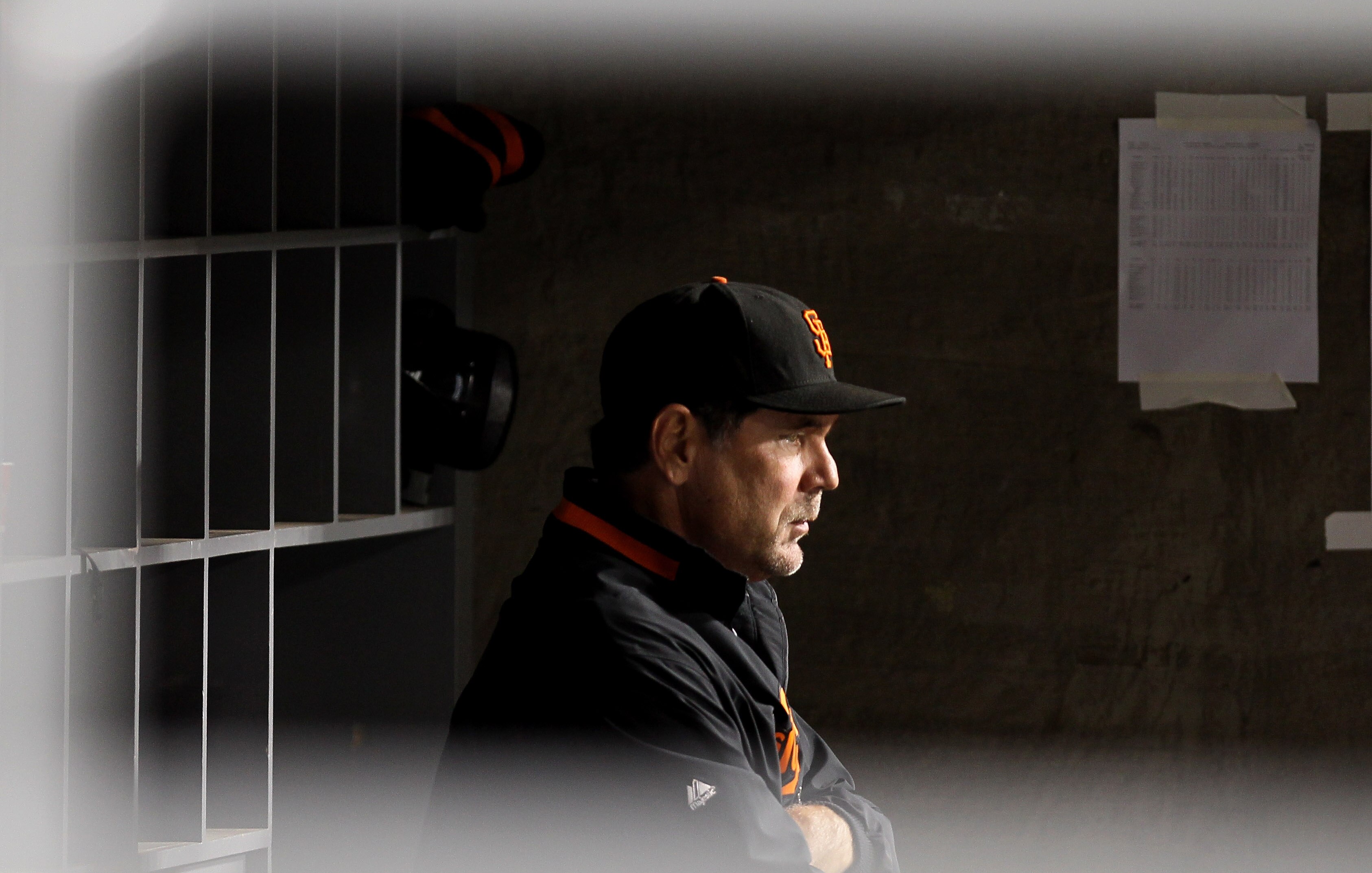 LOS ANGELES - JULY 19: Manager Bruce Bochy of the San Francisco Giants looks on from the dugout during the game with the Los Angeles Dodgers on July 19, 2010 at Dodger Stadium in Los Angeles, California.  The Giants won 5-2. (Photo by Stephen Dunn/Getty I