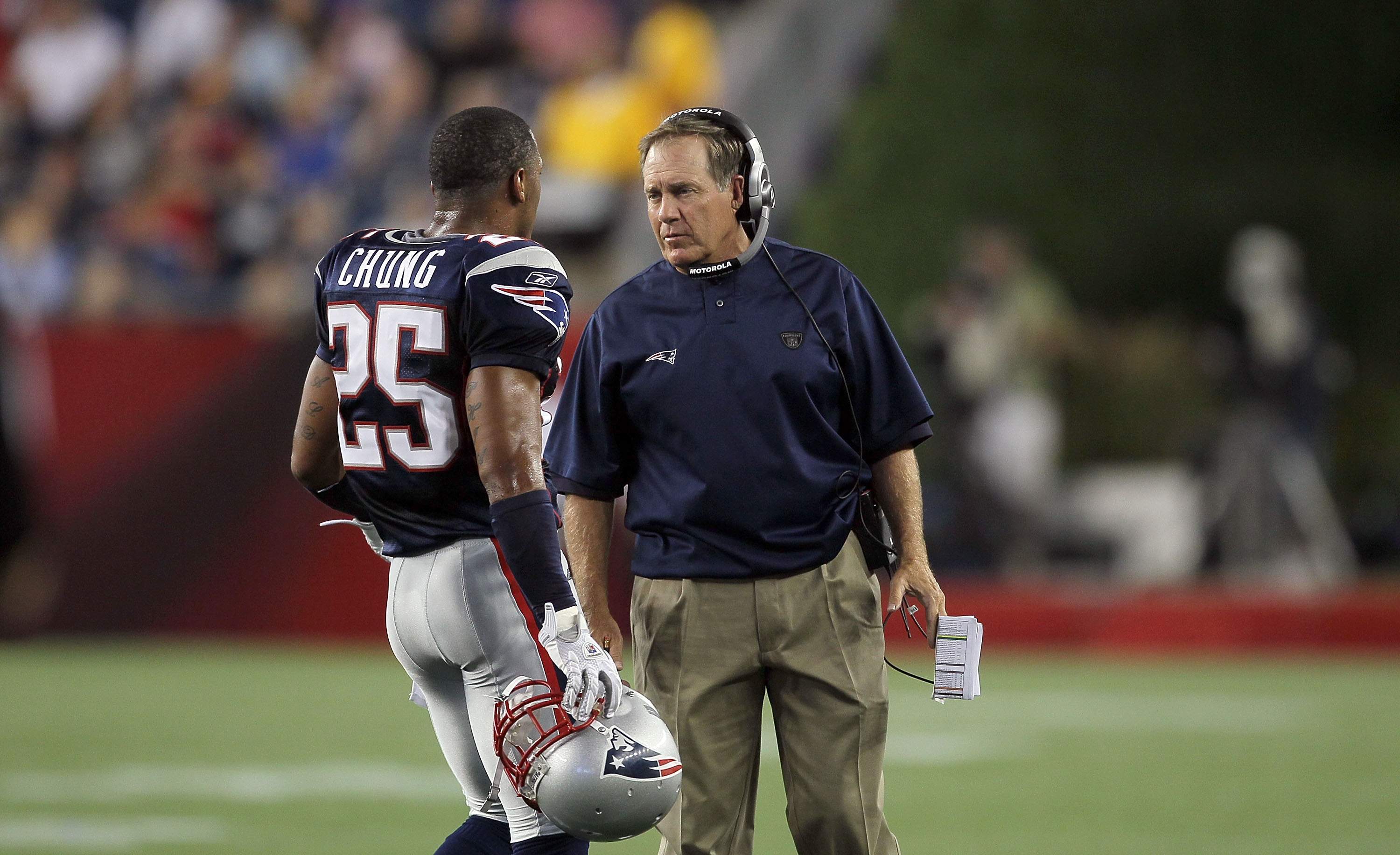 FOXBORO, MA - AUGUST 12: Patrick Chung # 25 and Coach Bill Belichick of the New England Patriots talk during the preseason game against the New Orleans Saints at Gillette Stadium on August 12, 2010 in Foxboro, Massachusetts. (Photo by Jim Rogash/Getty Ima