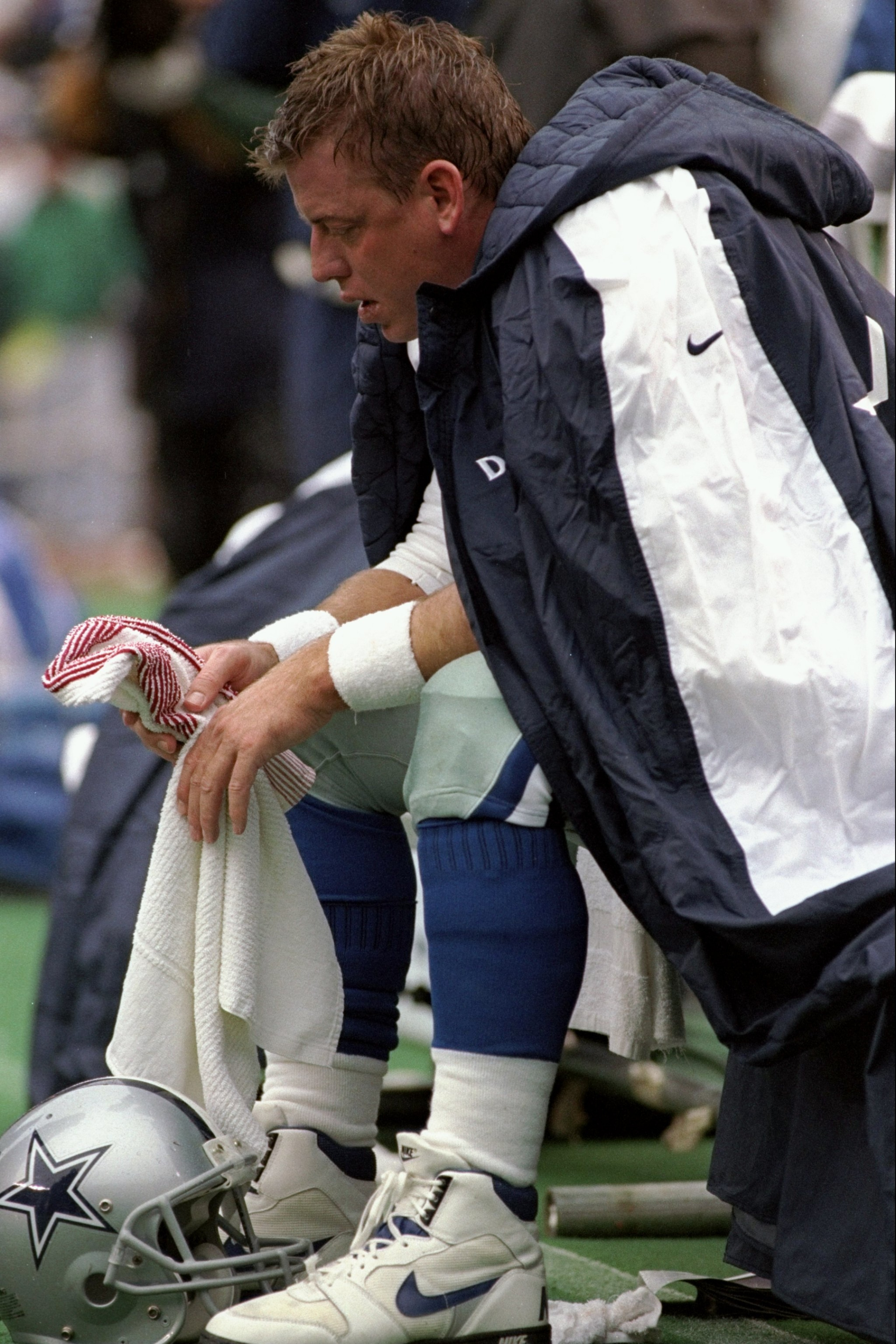 26 Oct 1997:  Quarterback Troy Aikman of the Dallas Cowboys sits on the bench after suffering a concussion during a game against the Philadelphia Eagles at Veterans Stadium in Philadelphia, Pennsylvania.  The Eagles won the game, 13-12. Mandatory Credit: