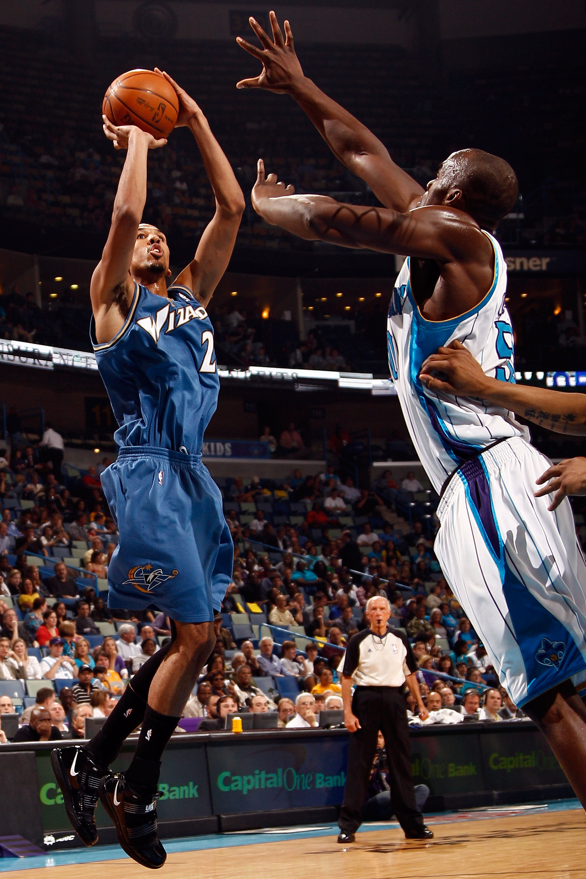 NEW ORLEANS - MARCH 31:  Shaun Livingston #2 of the Washington Wizards shoots the ball over Emeka Okafor #50 of the New Orleans Hornets at New Orleans Arena on March 31, 2010 in New Orleans, Louisiana.  The Wizards defeated the Hornets 96-91.  NOTE TO USE