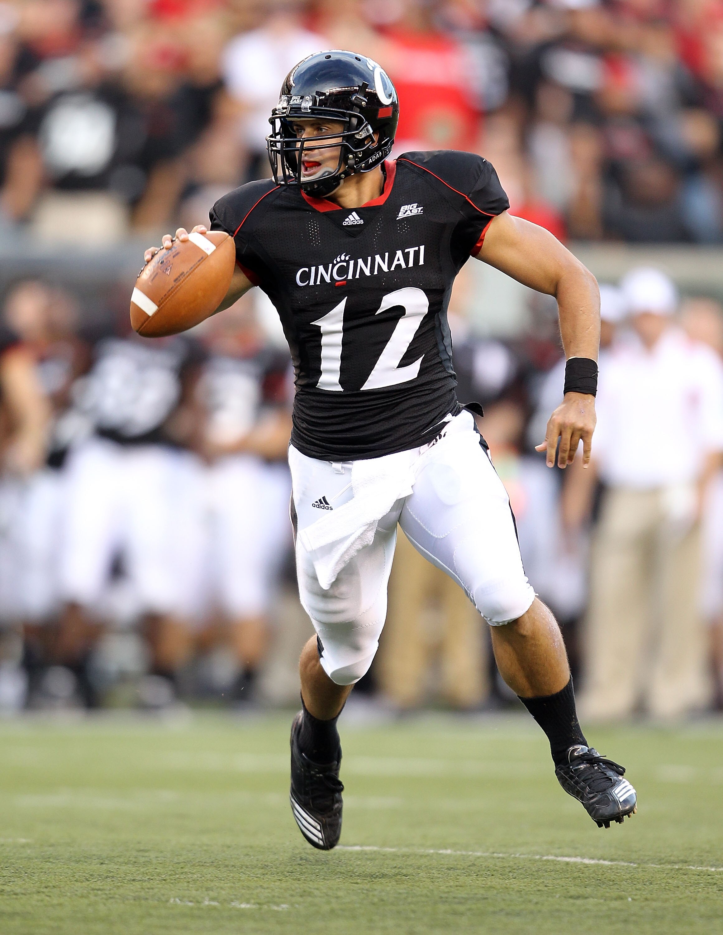 CINCINNATI - SEPTEMBER 25:  Zach Collaros #12 of  the Cincinnati Bearcats runs with the ball during the game against the Oklahoma Sooners at Paul Brown Stadium on September 25, 2010 in Cincinnati, Ohio.  (Photo by Andy Lyons/Getty Images)