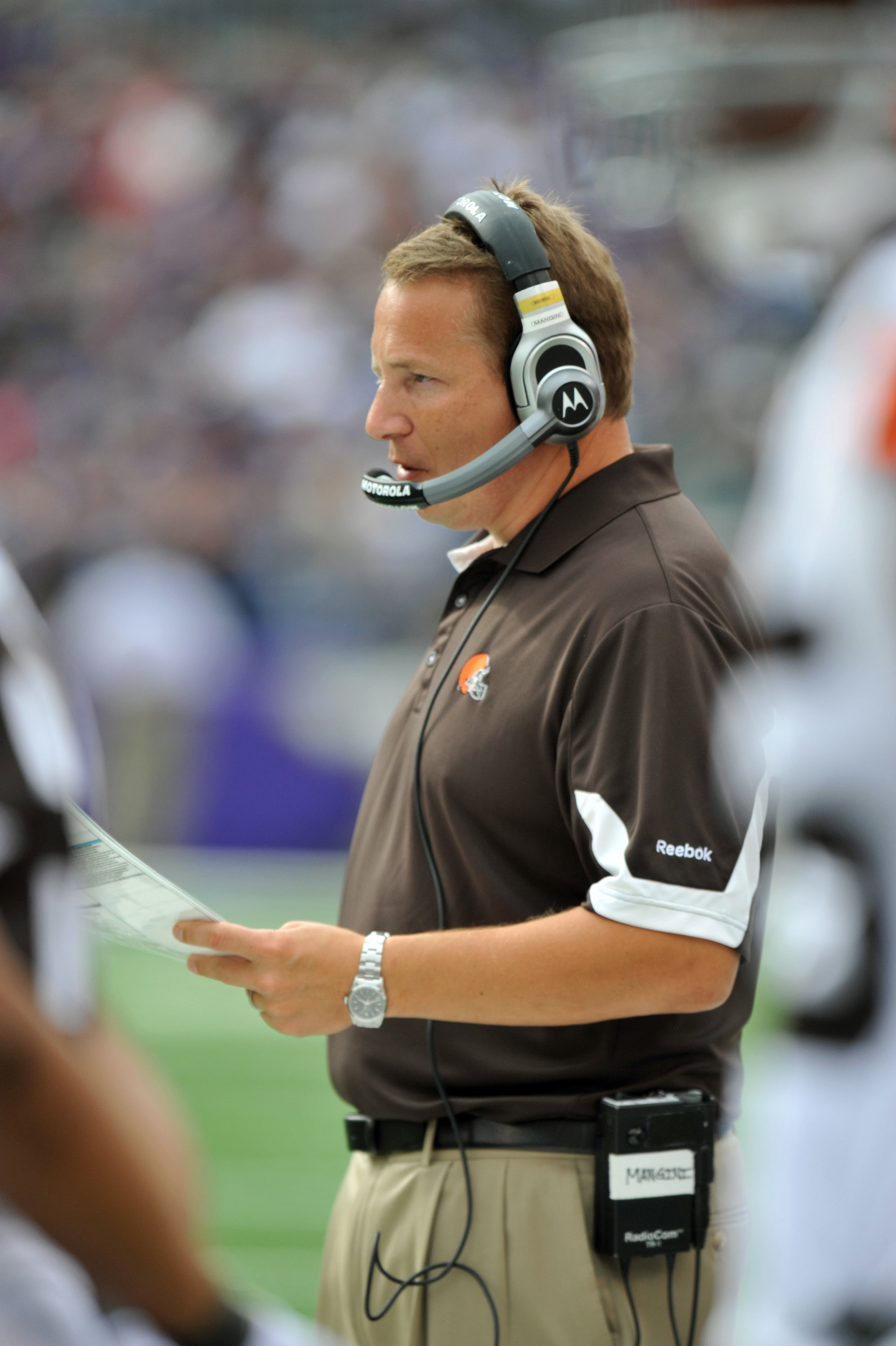 BALTIMORE - SEPTEMBER 26:  Head coach  Eric Mangini of the Cleveland Browns coaches against the Baltimore Ravens  at M&T Bank Stadium on September 26, 2010 in Baltimore, Maryland. The Ravens defeated the Browns 24-17. (Photo by Larry French/Getty Images)