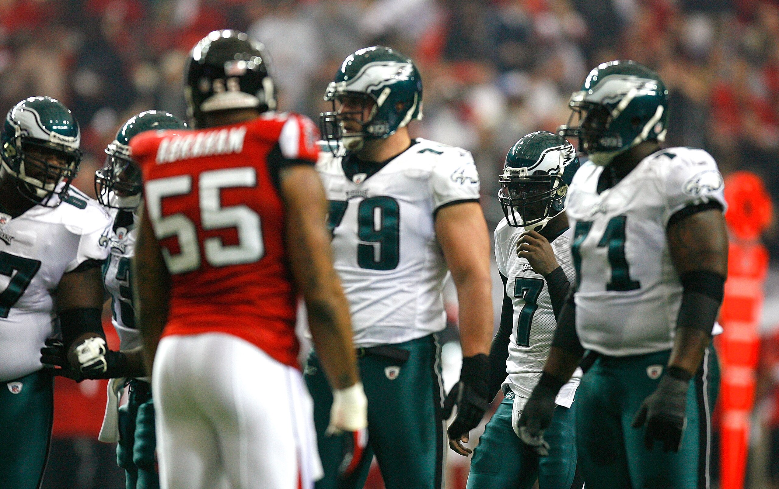 ATLANTA - DECEMBER 06: Michael Vick #7 of the Philadelphia Eagles steps in behind the offensive line during the game against the Atlanta Falcons at the Georgia Dome on December 6, 2009 in Atlanta, Georgia. (Photo by Kevin C. Cox/Getty Images) ATLANTA - DECEMBER 06: Michael Vick #7 of the Philadelphia Eagles steps in behind the offensive line during the game against the Atlanta Falcons at the Georgia Dome on December 6, 2009 in Atlanta, Georgia. (Photo by Kevin C. Cox/Getty Images)