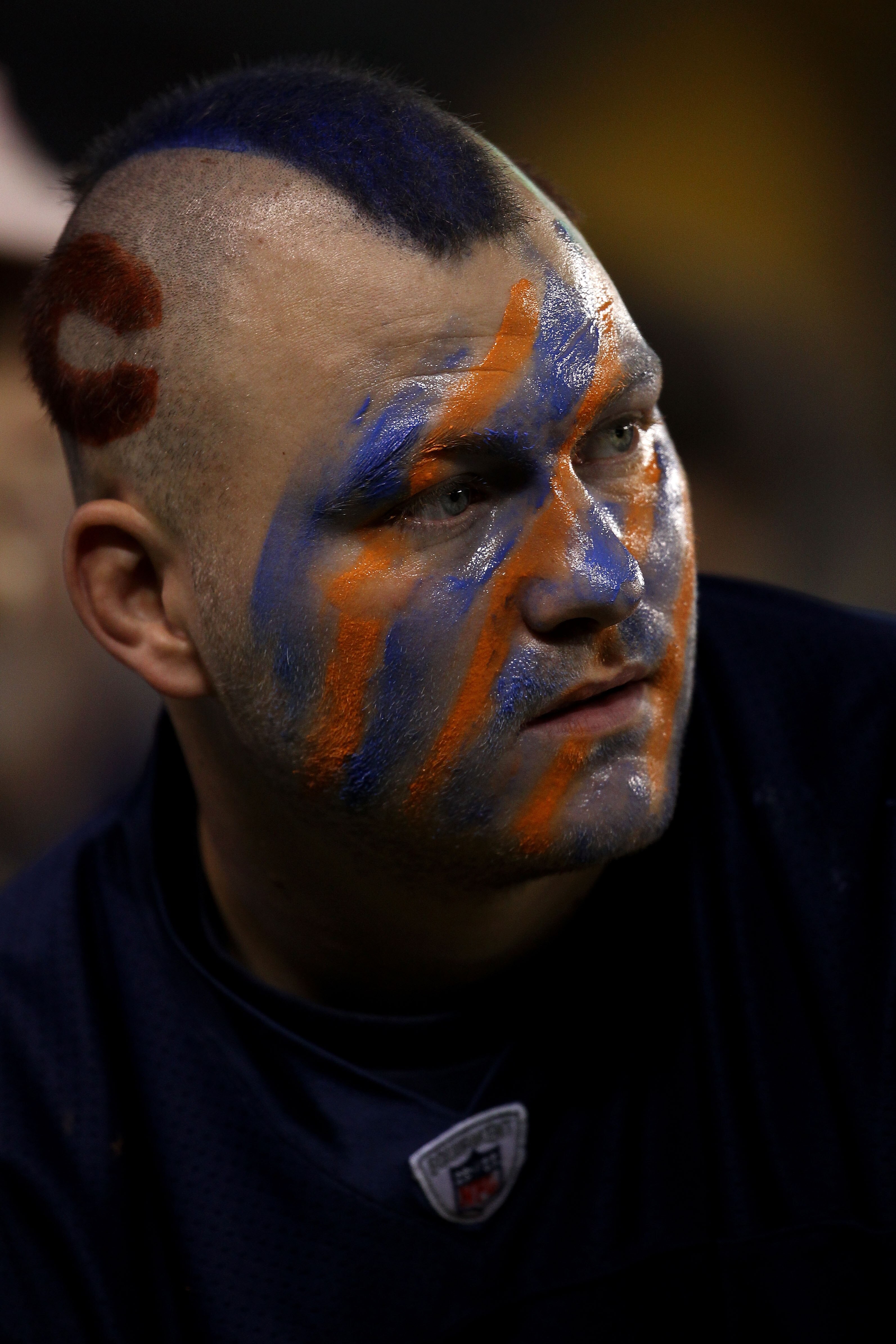 CHICAGO - SEPTEMBER 27:  A fan of the Chicago Bears shows support for his team as he looks on against the Green Bay Packers at Soldier Field on September 27, 2010 in Chicago, Illinois.  (Photo by Jonathan Daniel/Getty Images)