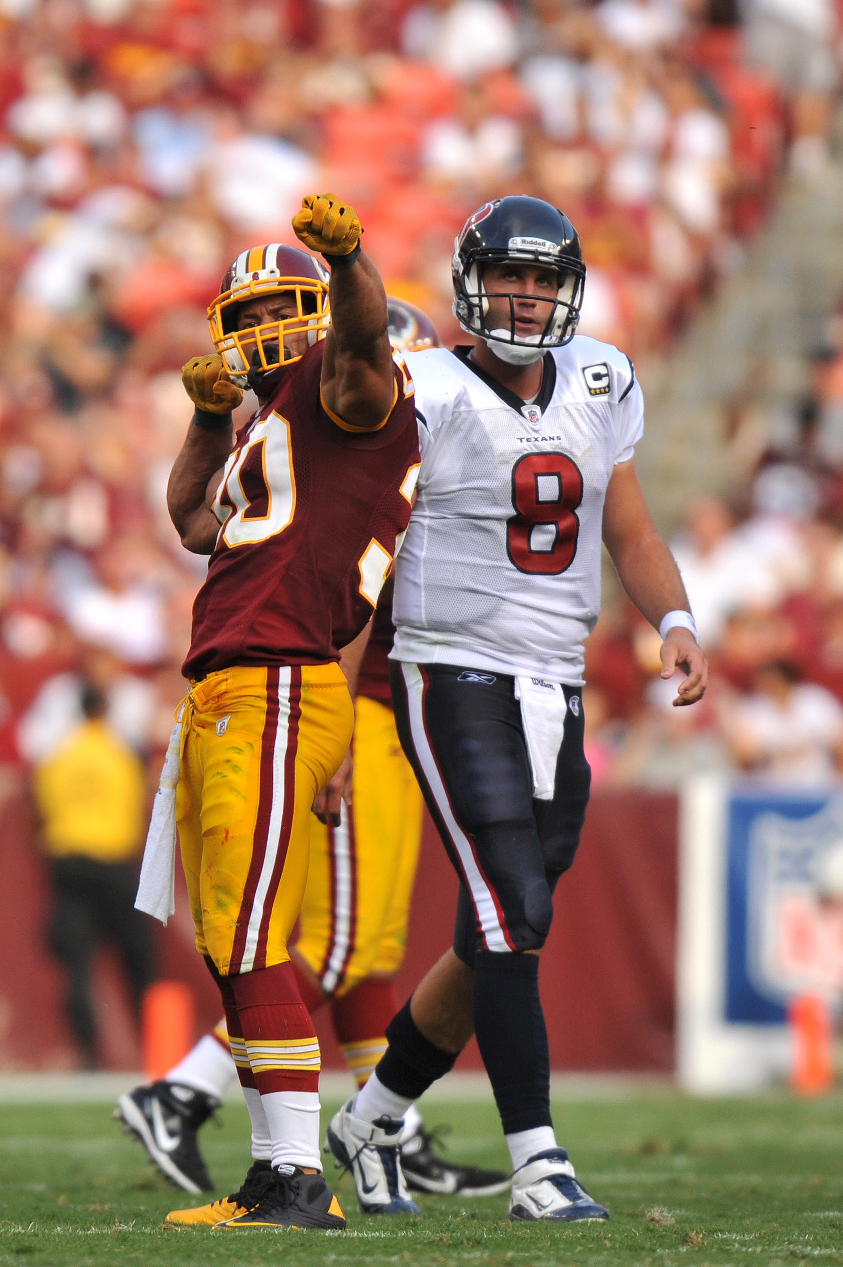 LANDOVER, MD - SEPTEMBER 19:  LaRon Landry #30 of the Washington Redskins celebrates a a sack of Matt Schaub #8 of the Houston Texans at FedExField on September 19, 2010 in Landover, Maryland. The Texans defeated the Redskins in overtime 30-27. (Photo by 