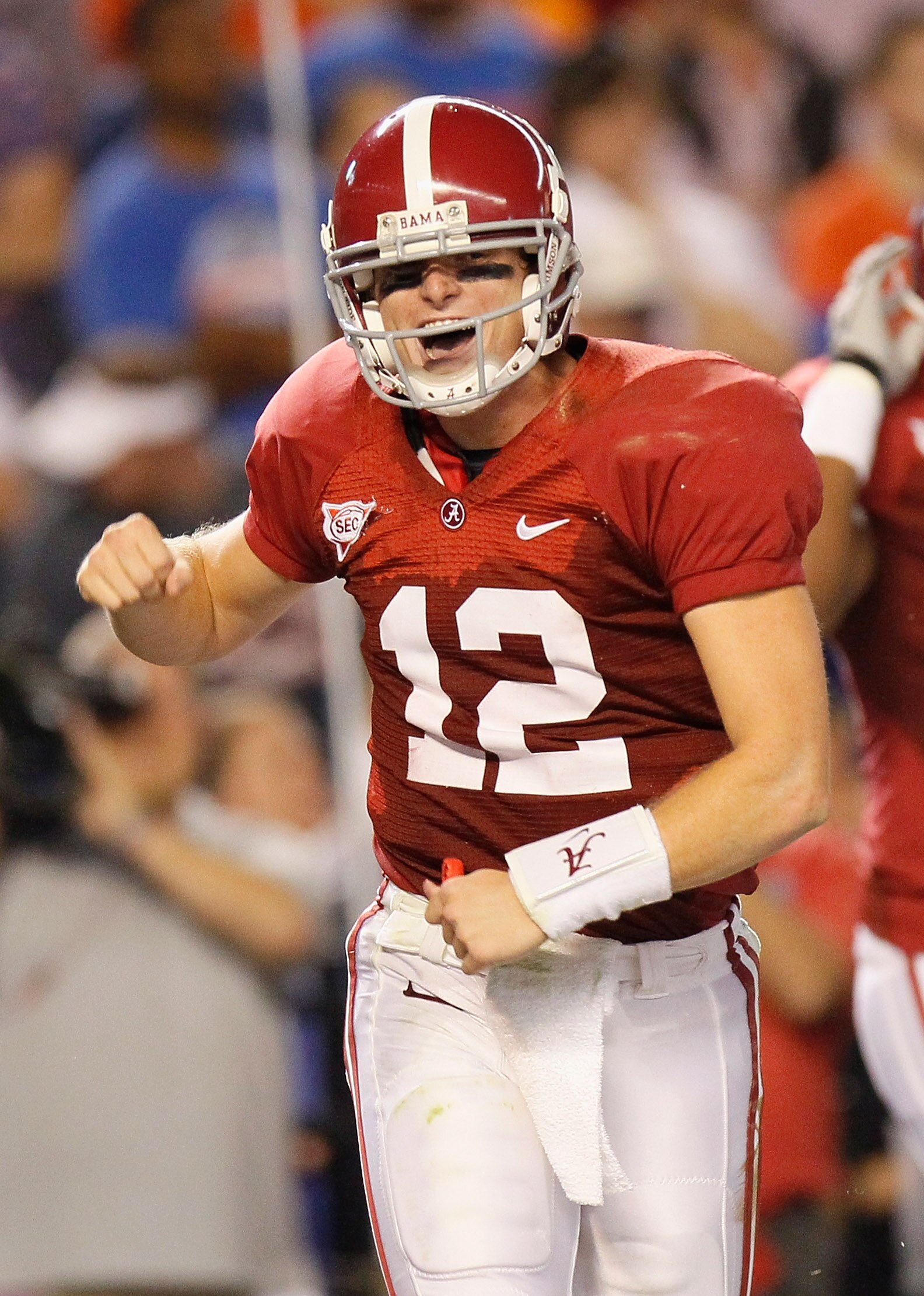 TUSCALOOSA, AL - OCTOBER 02:  Quarterback Greg McElroy #12 of the Alabama Crimson Tide celebrates after a touchdown thrown by Marquis Maze #4 against the Florida Gators at Bryant-Denny Stadium on October 2, 2010 in Tuscaloosa, Alabama.  (Photo by Kevin C.