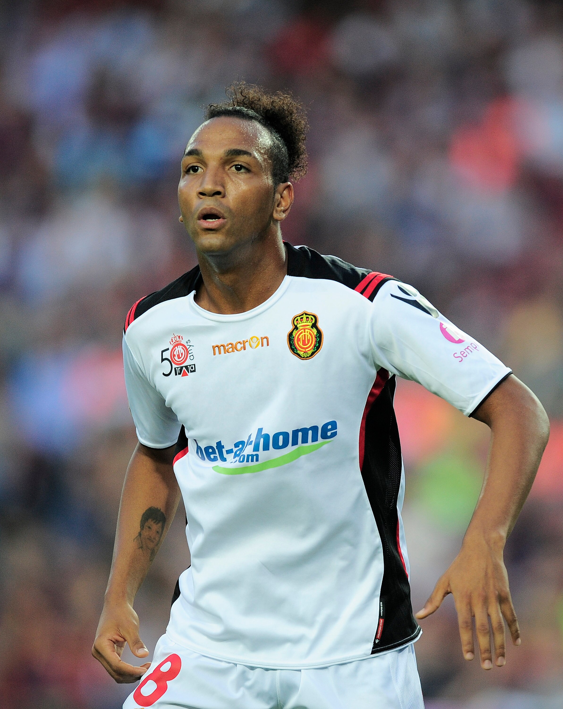 BARCELONA, SPAIN - OCTOBER 03:  Emilio Nsue of Mallorca looks on during the La Liga match between Barcelona and Mallorca at the Camp Nou stadium on October 3, 2010 in Barcelona, Spain. The Match Ended in a 1-1 draw.  (Photo by David Ramos/Getty Images)