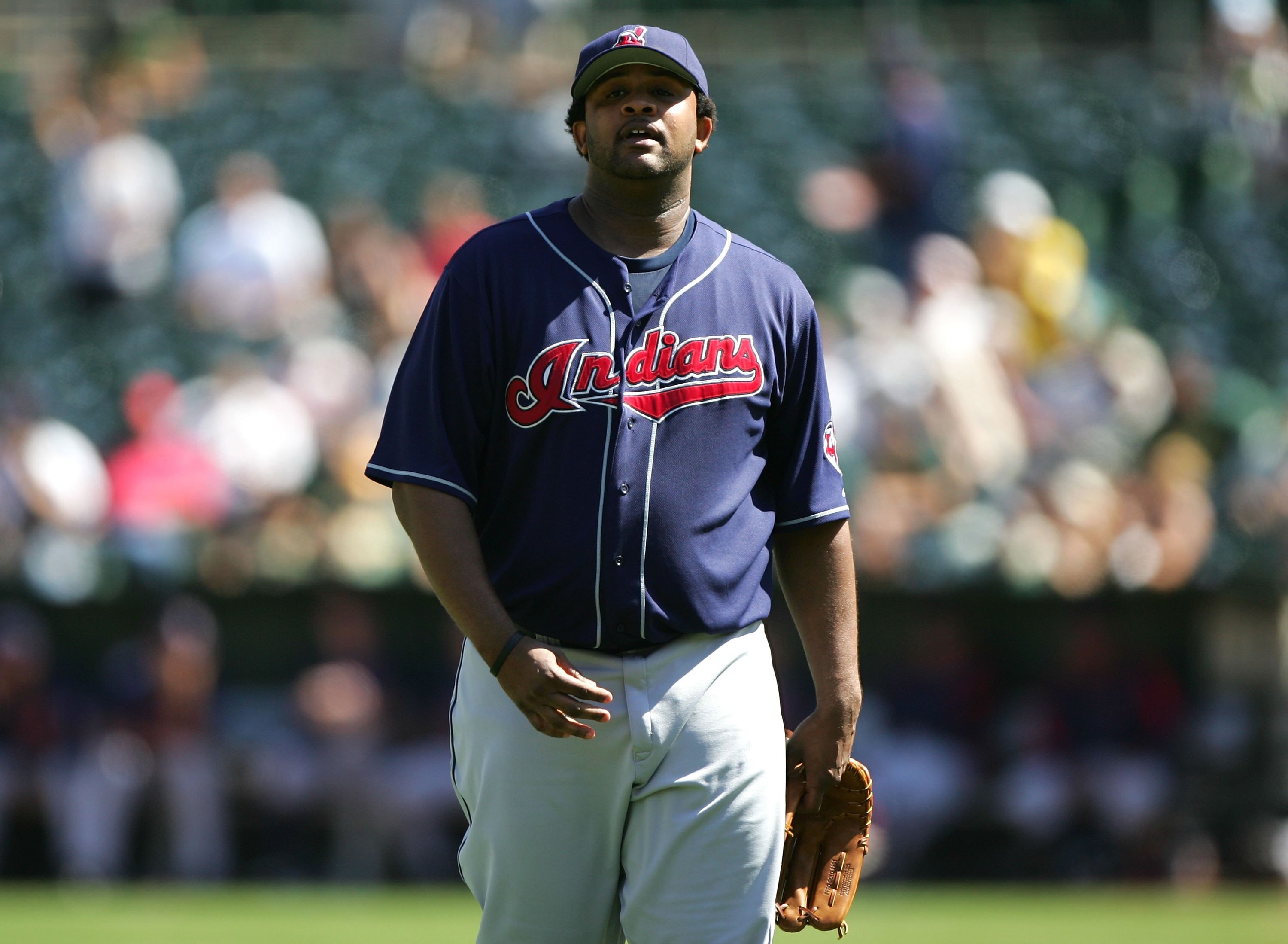 OAKLAND, CA - SEPTEMBER 21:   C.C. Sabathia #52 of the Cleveland Indians walks around the mound against the Oakland Athletics at an MLB game at McAfee Coliseum on September 21, 2006 in Oakland, California.  (Photo by Jed Jacobsohn/Getty Images)