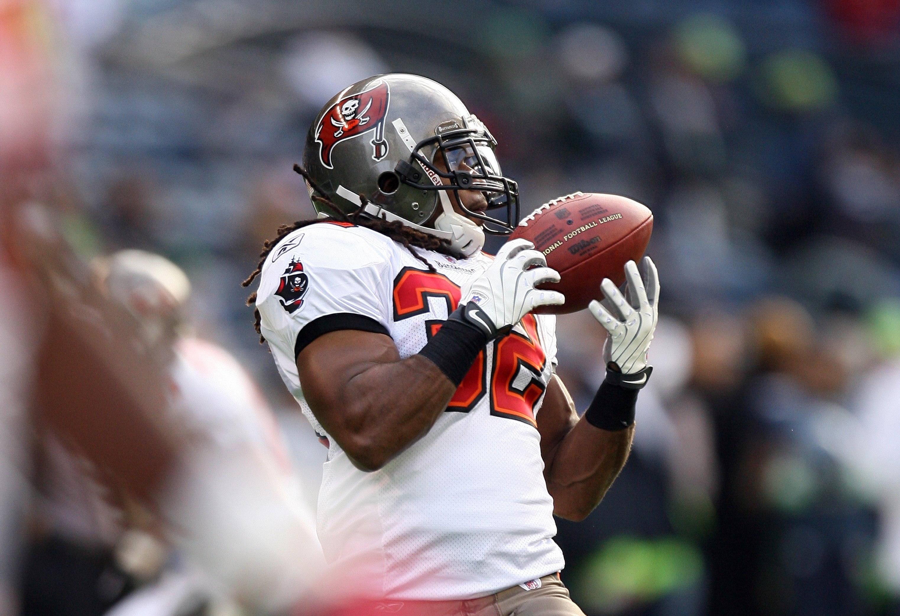 SEATTLE - DECEMBER 20:  Kareem Huggins #32 of the Tampa Bay Buccaneers warms up prior to their game against the Seattle Seahawks on December 20, 2009 at Qwest Field in Seattle, Washington. The Buccaneers defeated the Seahawks 24-7. (Photo by Otto Greule J