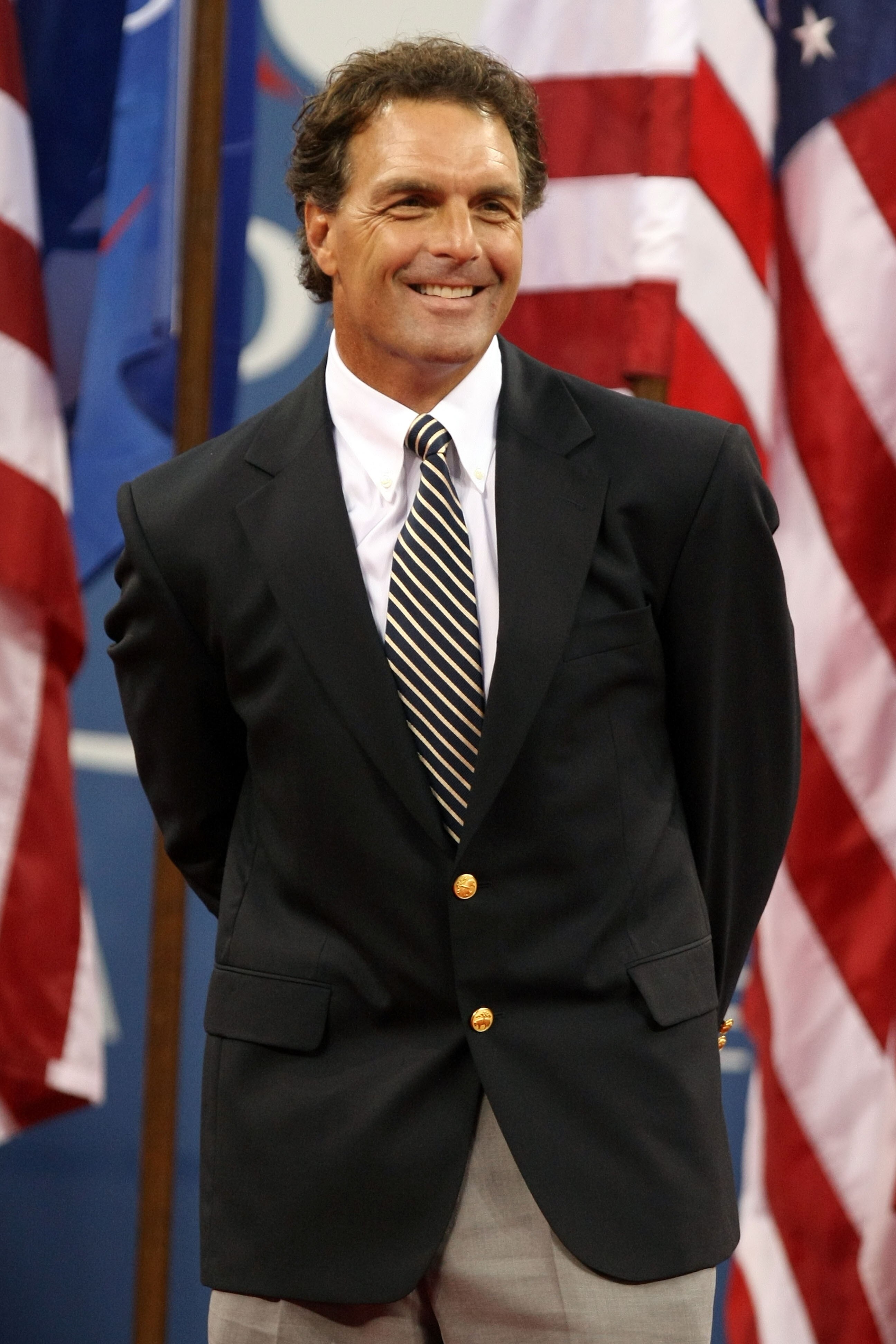 NEW YORK - AUGUST 31:  Doug Flutie looks on during the Opening Ceremony of the 2009 U.S. Open at the USTA Billie Jean King National Tennis Center on August 31, 2009 in Flushing neighborhood of the Queens borough of New York City.  (Photo by Al Bello/Getty