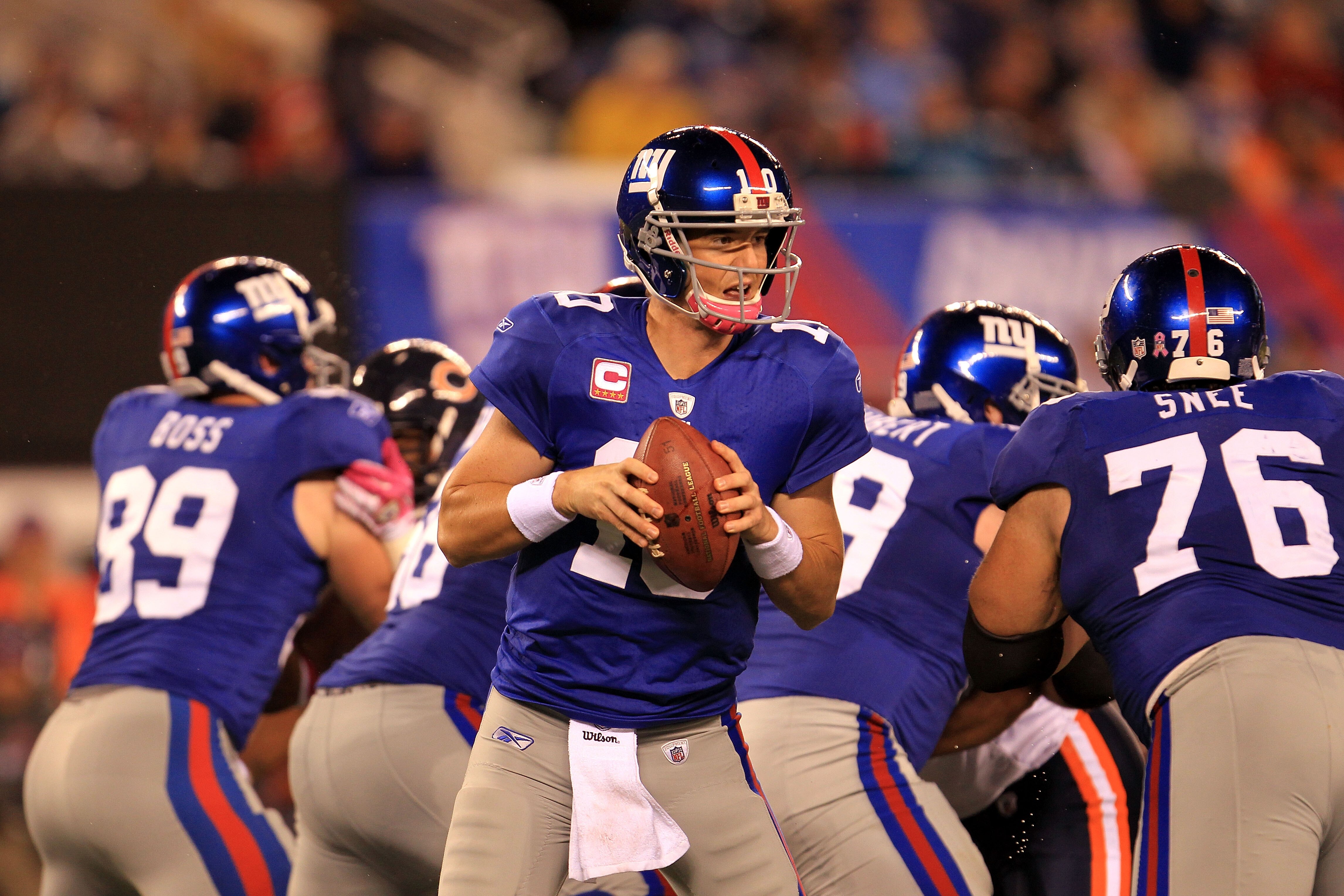 EAST RUTHERFORD, NJ - OCTOBER 03:  Eli Manning #10 of the New York Giants drops back against the Chicago Bears at New Meadowlands Stadium on October 3, 2010 in East Rutherford, New Jersey.  (Photo by Chris McGrath/Getty Images)