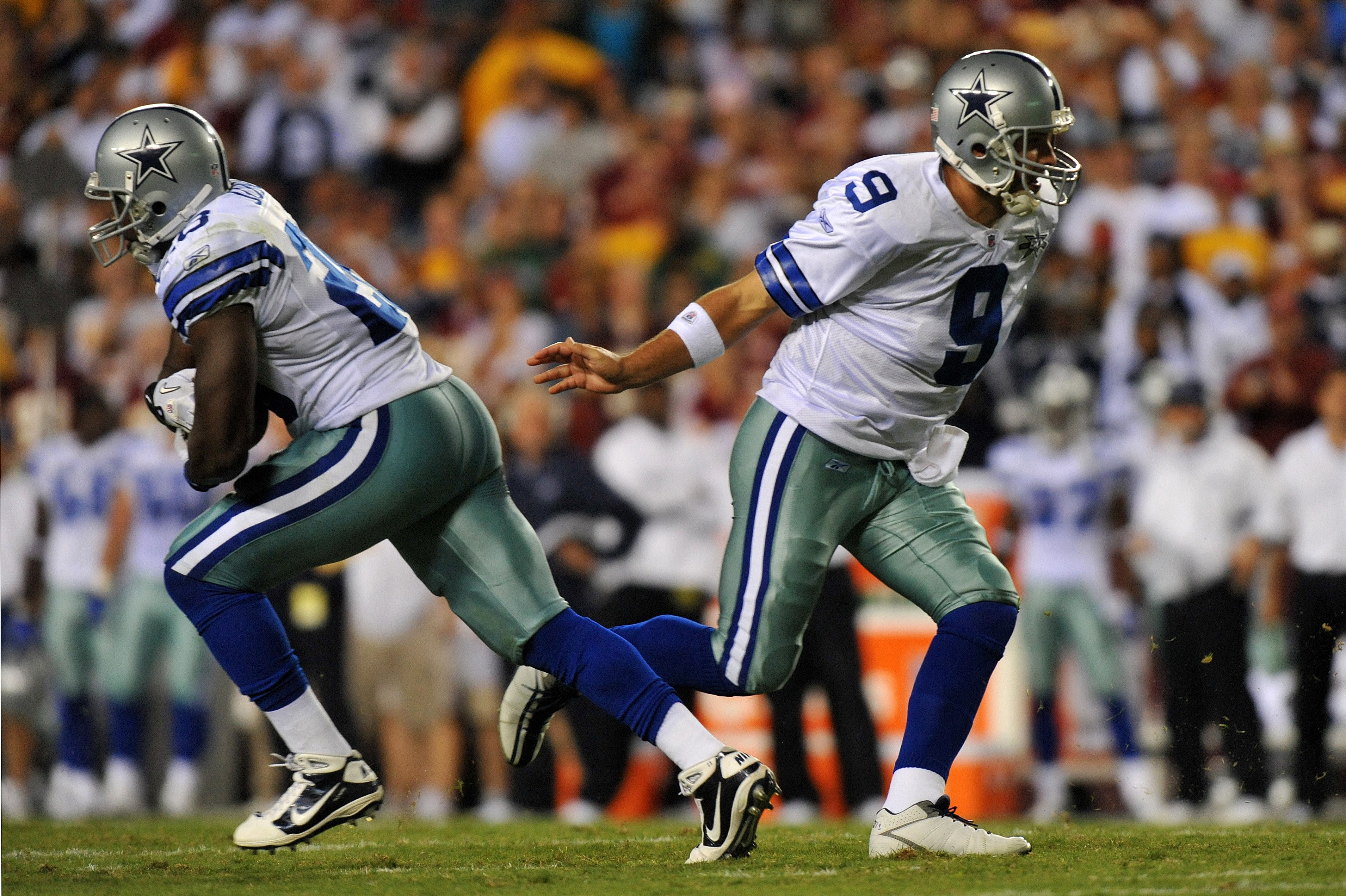 LANDOVER - SEPTEMBER 12:  Tony Romo #9 of the Dallas Cowboys hands off to Felix Jones #28 during the NFL season opener against the Washington Redskins at FedExField on September 12, 2010 in Landover, Maryland. The Redskins defeated the Cowboys 13-7. (Phot