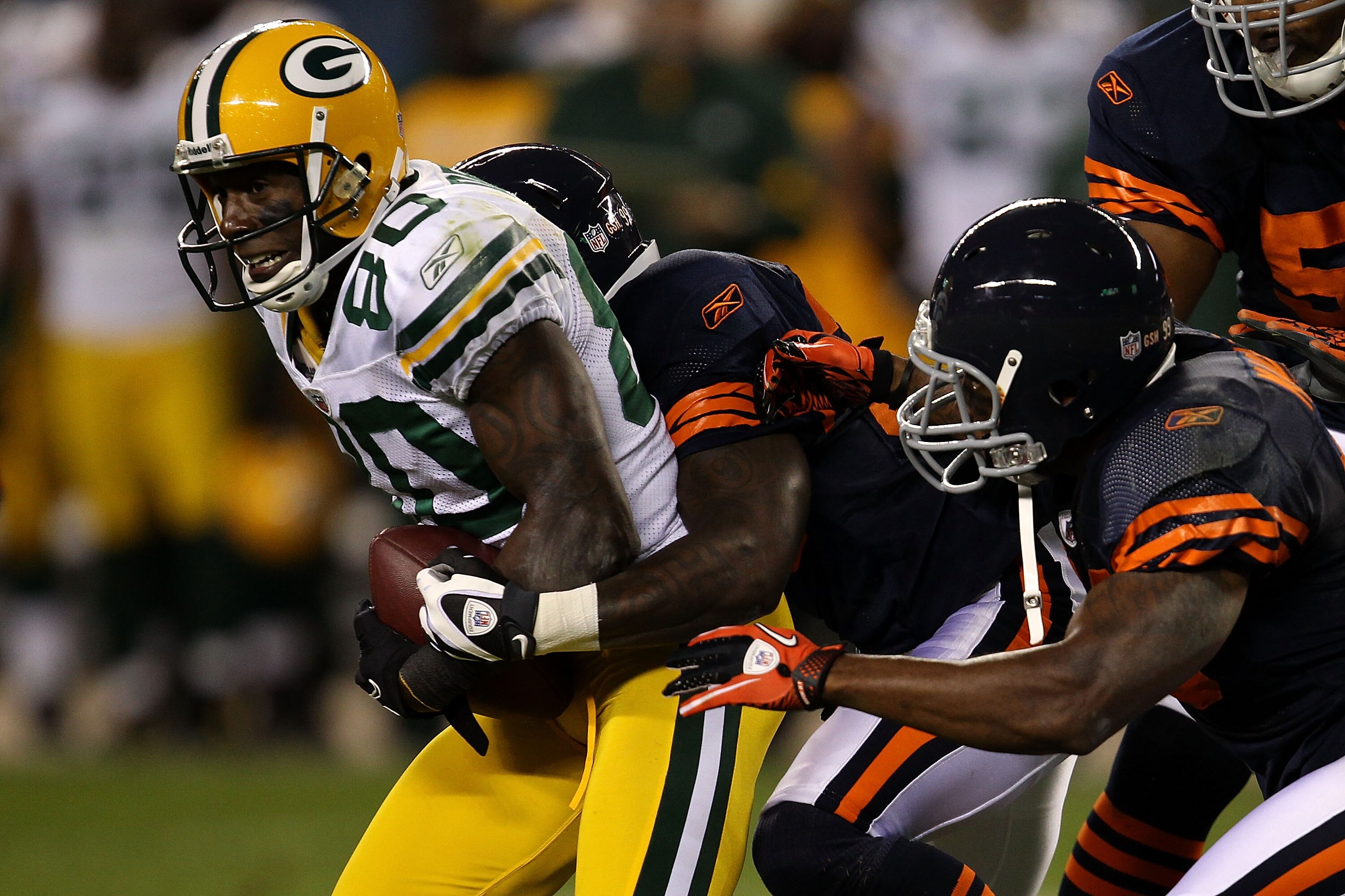 CHICAGO - SEPTEMBER 27:  Donald Driver #80 of the Green Bay Packers attempts to run for yards after the catch against the Chicago Bears at Soldier Field on September 27, 2010 in Chicago, Illinois.  (Photo by Jonathan Daniel/Getty Images)