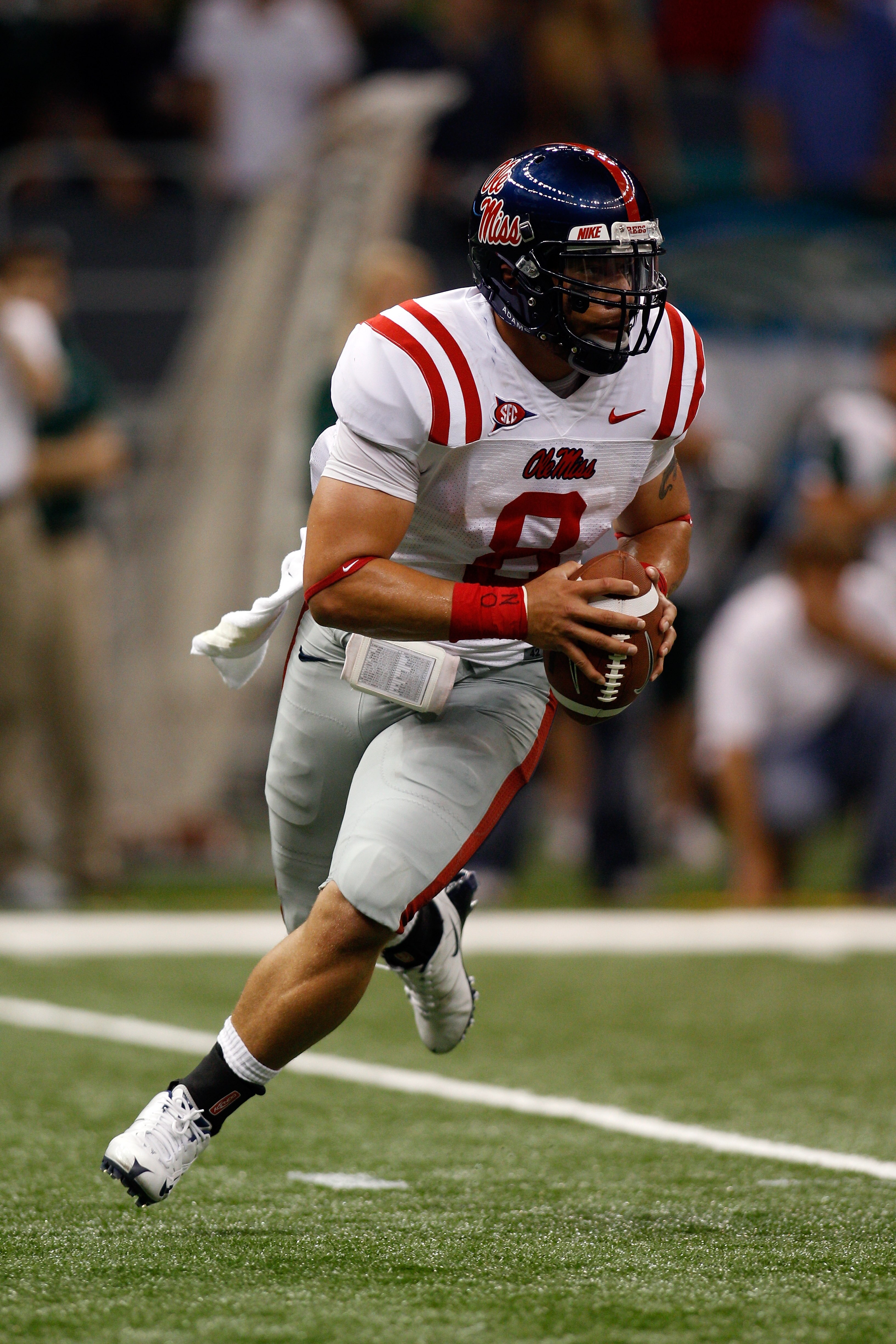 NEW ORLEANS - SEPTEMBER 11:  Jeremiah Masoli #8 of the Ole Miss Rebels in action against the the Tulane Green Wave at the Louisiana Superdome on September 11, 2010 in New Orleans, Louisiana.  Ole Miss defeated Tulane 27-13.  (Photo by Chris Graythen/Getty