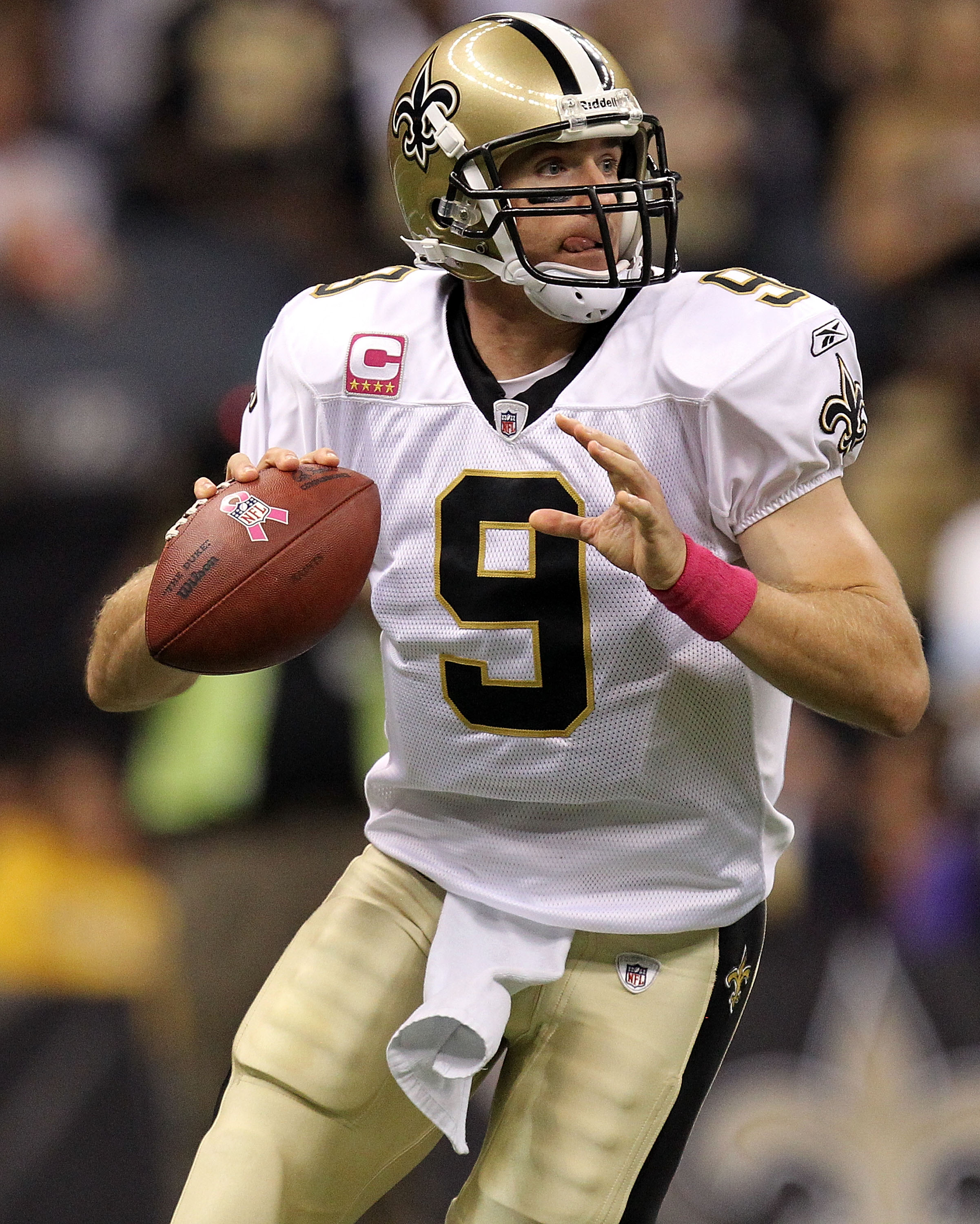 NEW ORLEANS - OCTOBER 03:  Quarterback Drew Brees #9 of the New Orleans Saints passes against the Carolina Panthers at the Louisiana Superdome on October 3, 2010 in New Orleans, Louisiana.  (Photo by Ronald Martinez/Getty Images)