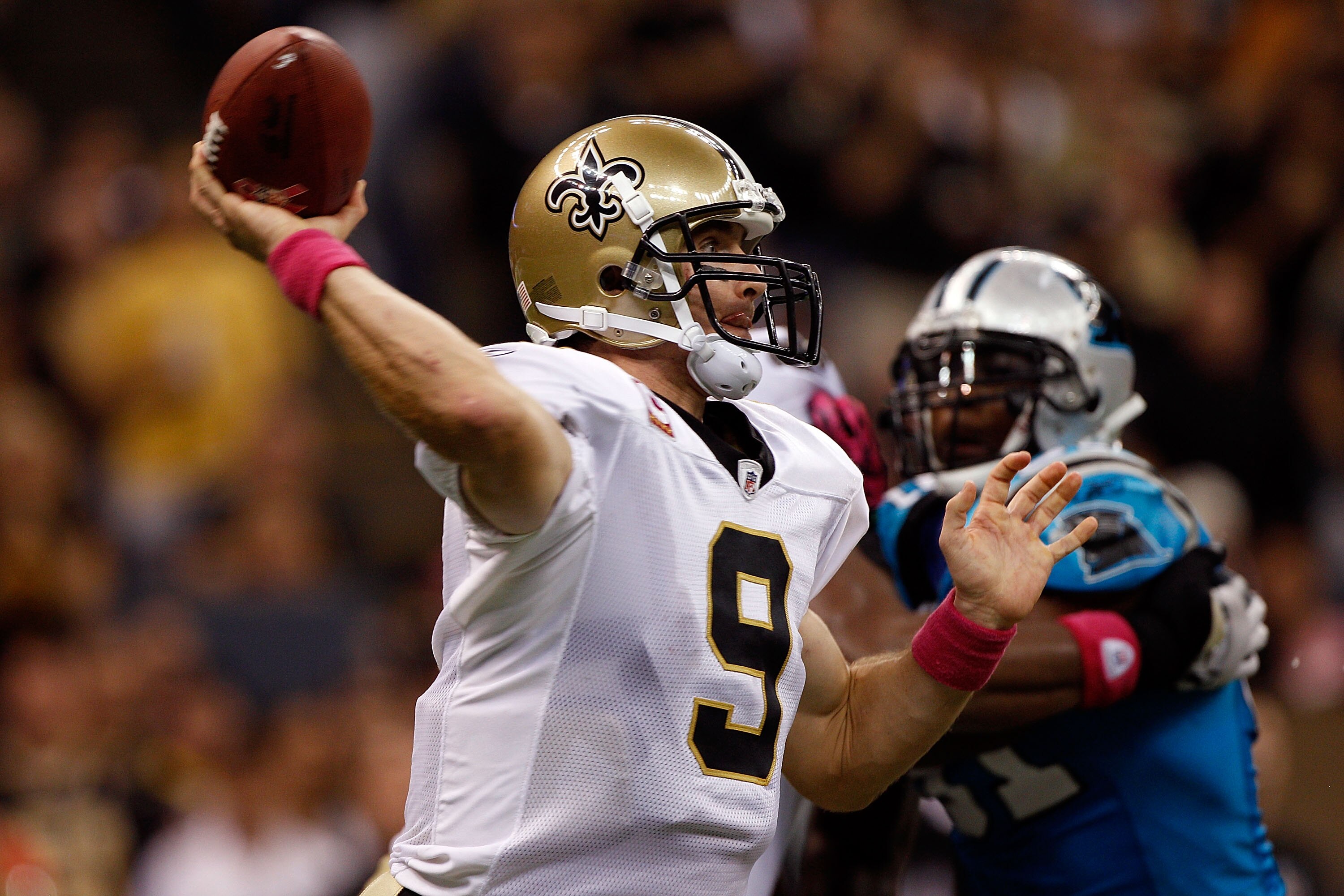 NEW ORLEANS - OCTOBER 03:  Drew Brees #9 of the New Orleans Saints throws the ball against the Carolina Panthers at the Louisiana Superdome on October 3, 2010 in New Orleans, Louisiana.  of the Carolina Panthers  (Photo by Chris Graythen/Getty Images)