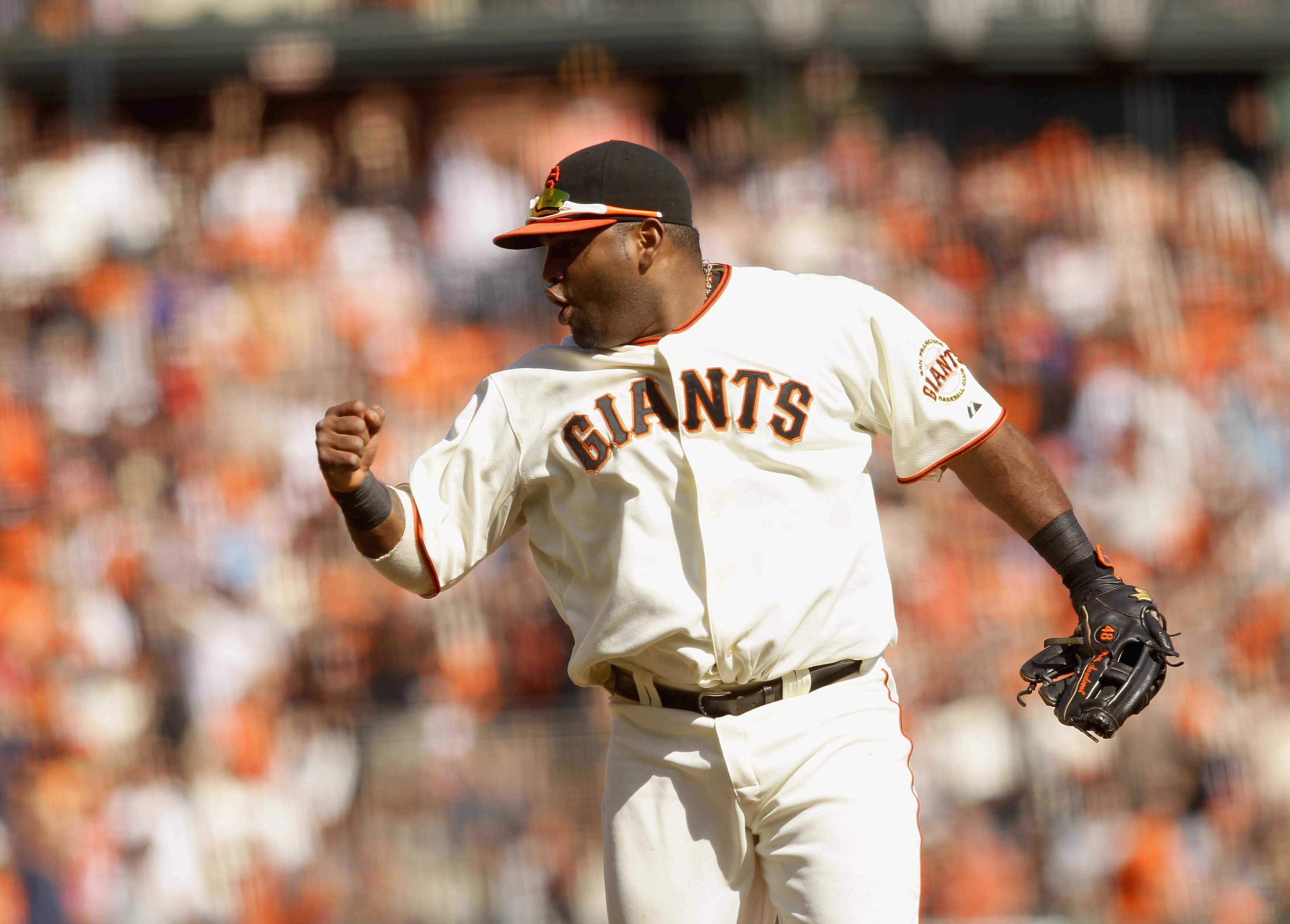 SAN FRANCISCO - OCTOBER 03:  Pablo Sandoval #48 of the San Francisco Giants celebrates after the end of the top of the sixth inning of their game against the San Diego Padres at AT&T Park on October 3, 2010 in San Francisco, California.  (Photo by Ezra Sh