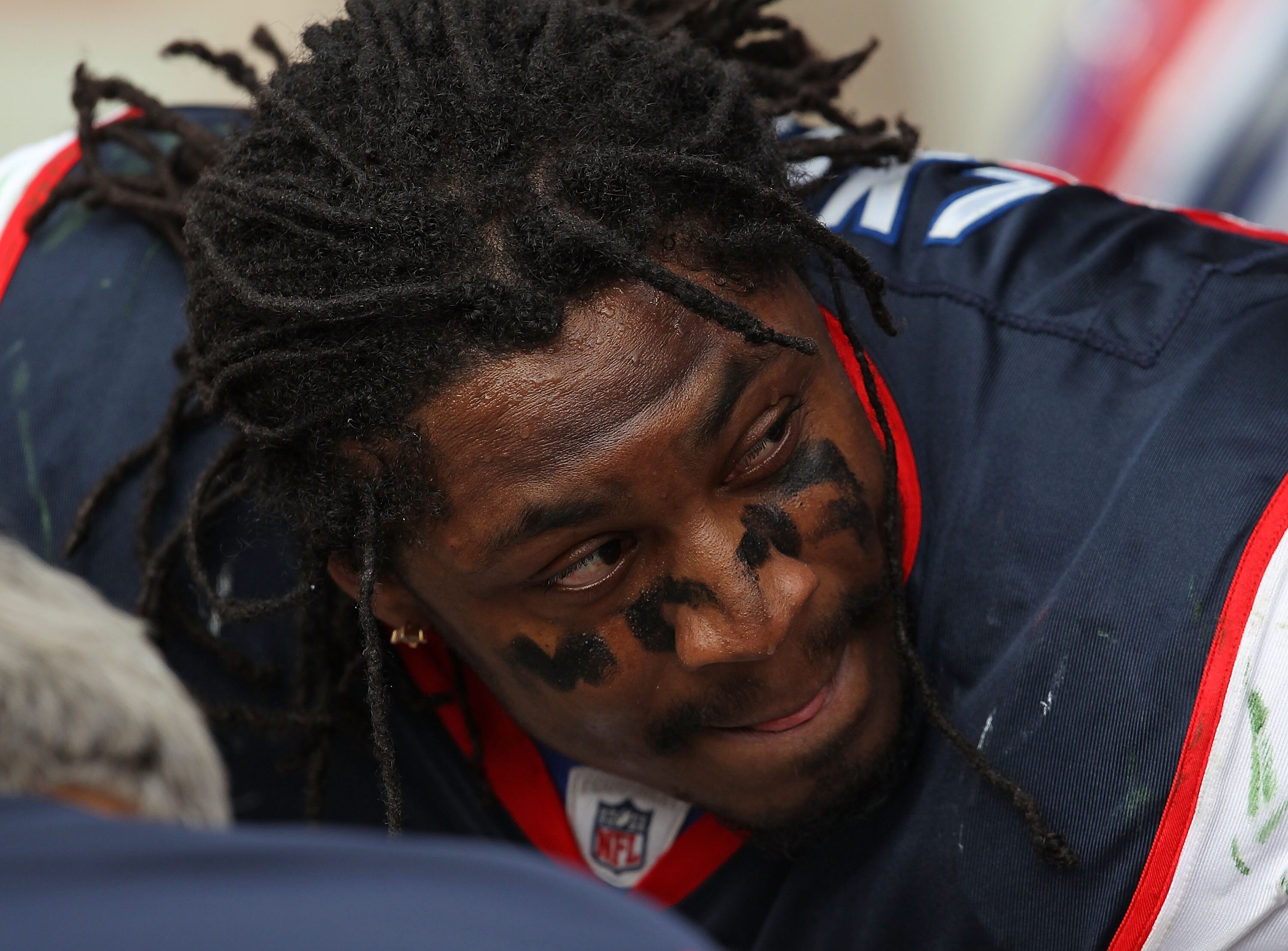 GREEN BAY, WI - SEPTEMBER 19: Marshawn Lynch #23 of the Buffalo Bills listens to coaches and teammates on the sidelines during a game against the Green Bay Packers at Lambeau Field on September 19, 2010 in Green Bay, Wisconsin. The Packers defeated the Bi