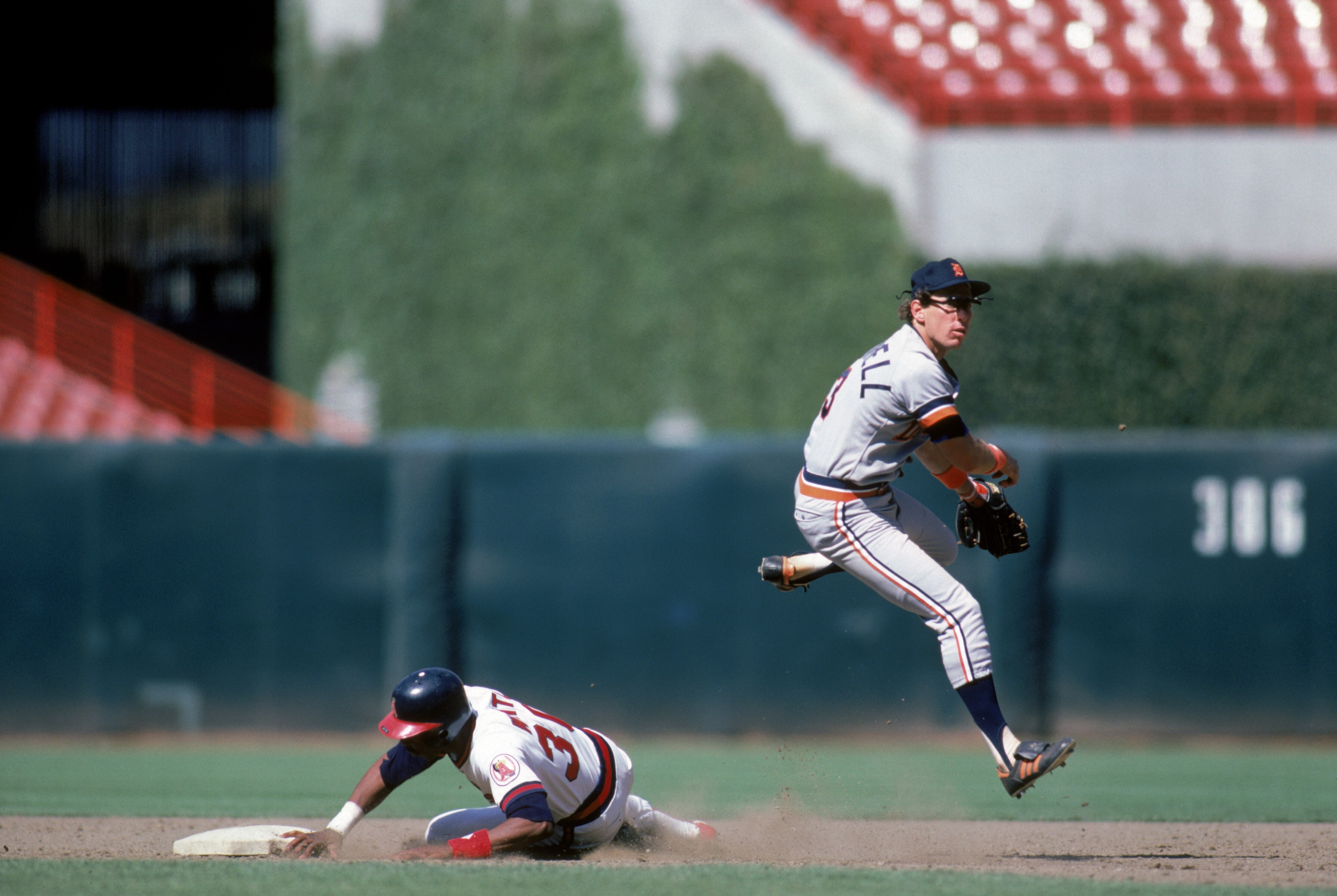 ANAHEIM, CA - 1986:  Alan Trammell #3 of the Detroit Tigers throws to first base during a game in the 1986 season against the California Angels at Anaheim Stadium in Anaheim, California.  (Photo by Rick Stewart/Getty Images)