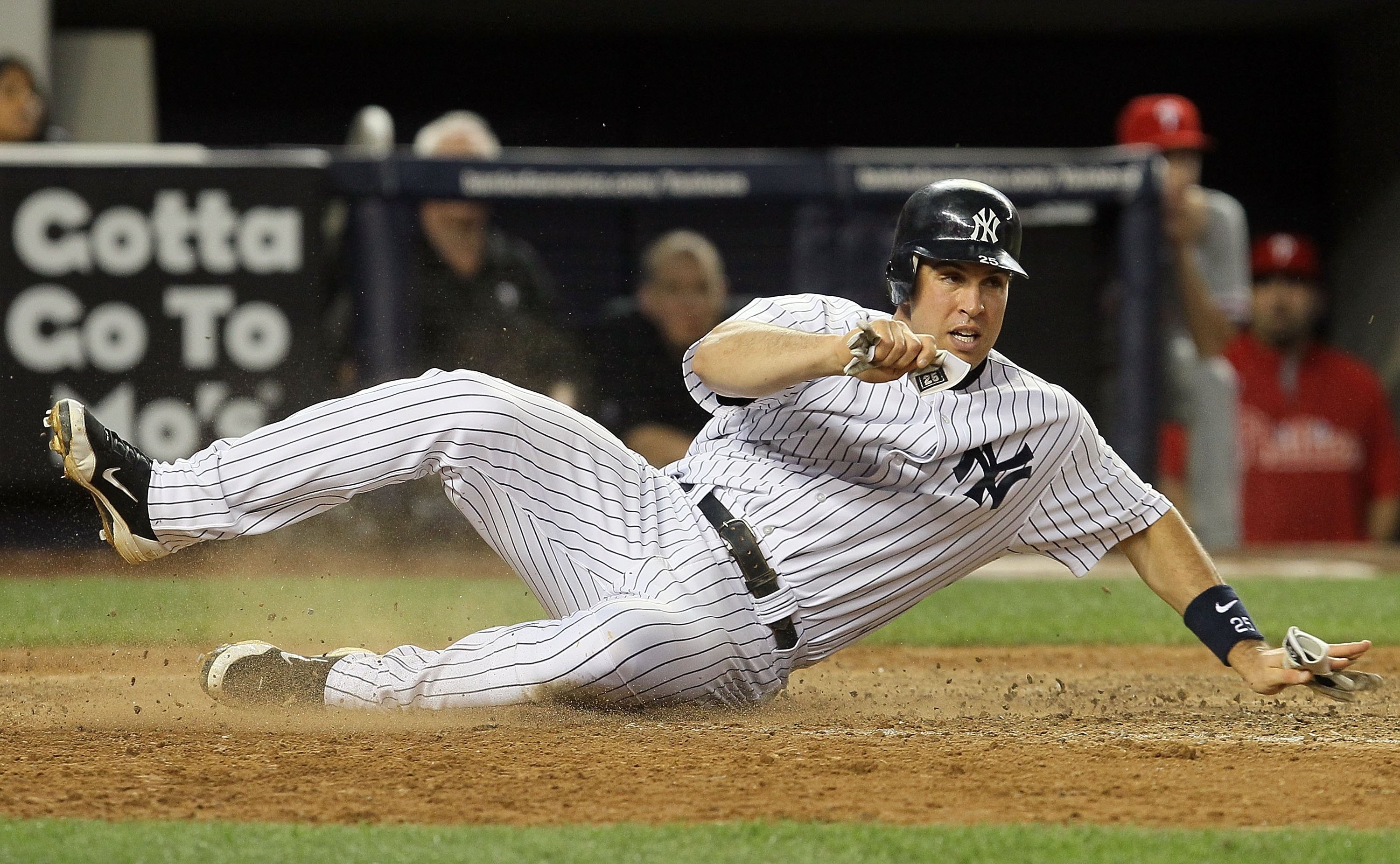NEW YORK - JUNE 17:  Mark Teixeira #25 of the New York Yankees scores a run in the sixth inning against the Philadelphia Phillies on June 17, 2010 at Yankee Stadium in the Bronx borough of New York City.  (Photo by Jim McIsaac/Getty Images)