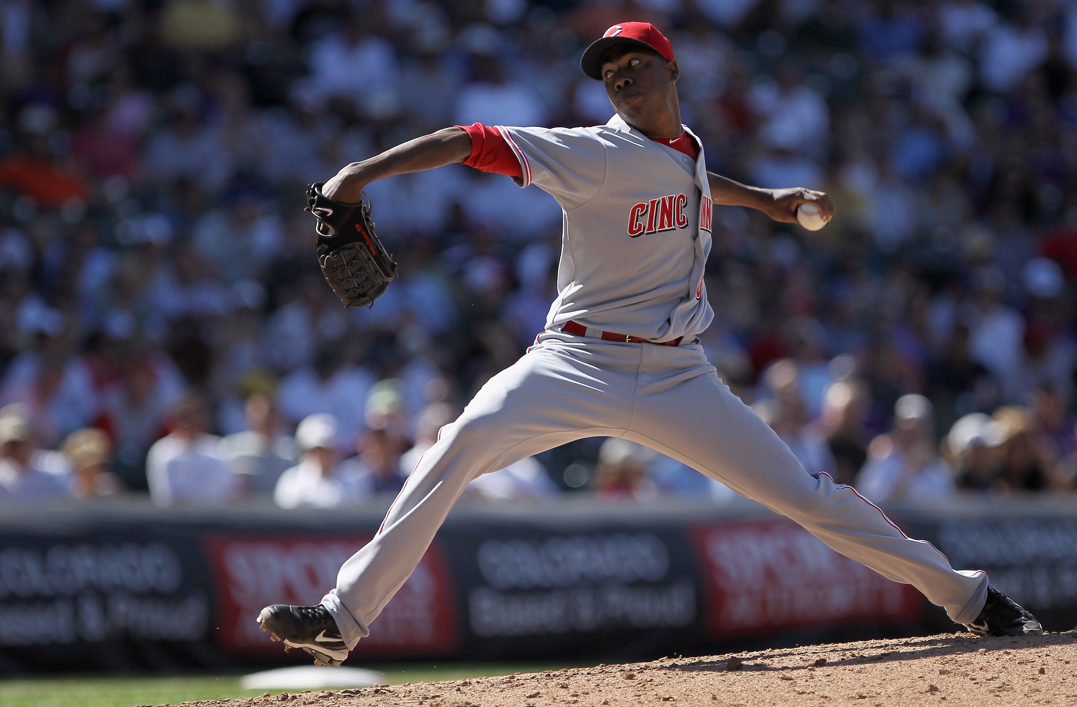 DENVER - SEPTEMBER 09:  Relief pitcher Aroldis Chapman #54 of the Cincinnati Reds delivers against the Colorado Rockies at Coors Field on September 9, 2010 in Denver, Colorado. The Rockies defeated the Reds 6-5.  (Photo by Doug Pensinger/Getty Images)