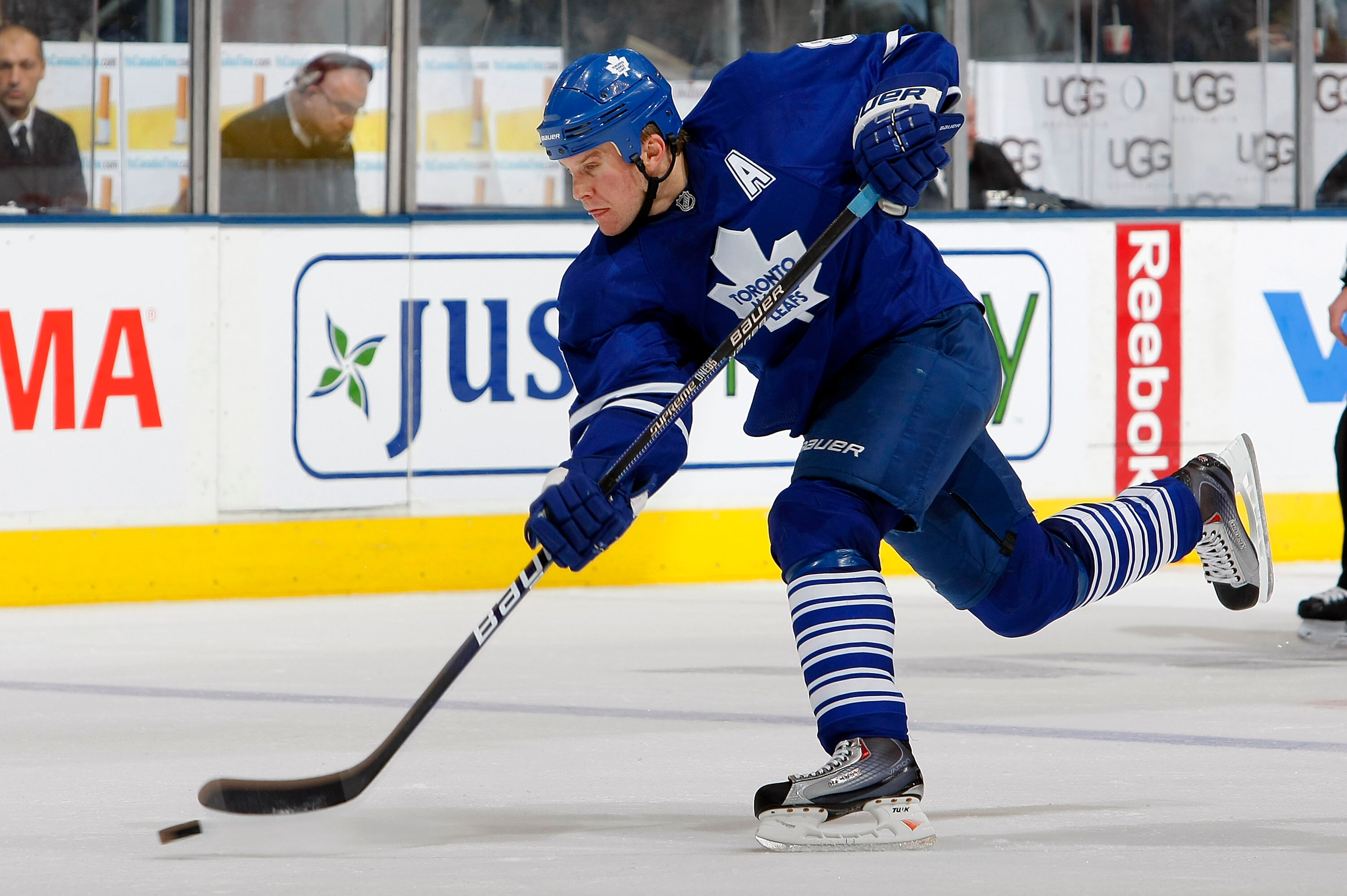 TORONTO - DECEMBER 26: Mike Komisarek #8 of the Toronto Maple Leafs takes a shot against the Montreal Canadiens during their NHL game at the Air Canada Centre December 26, 2009 in Toronto, Ontario.(Photo By Dave Sandford/Getty Images)