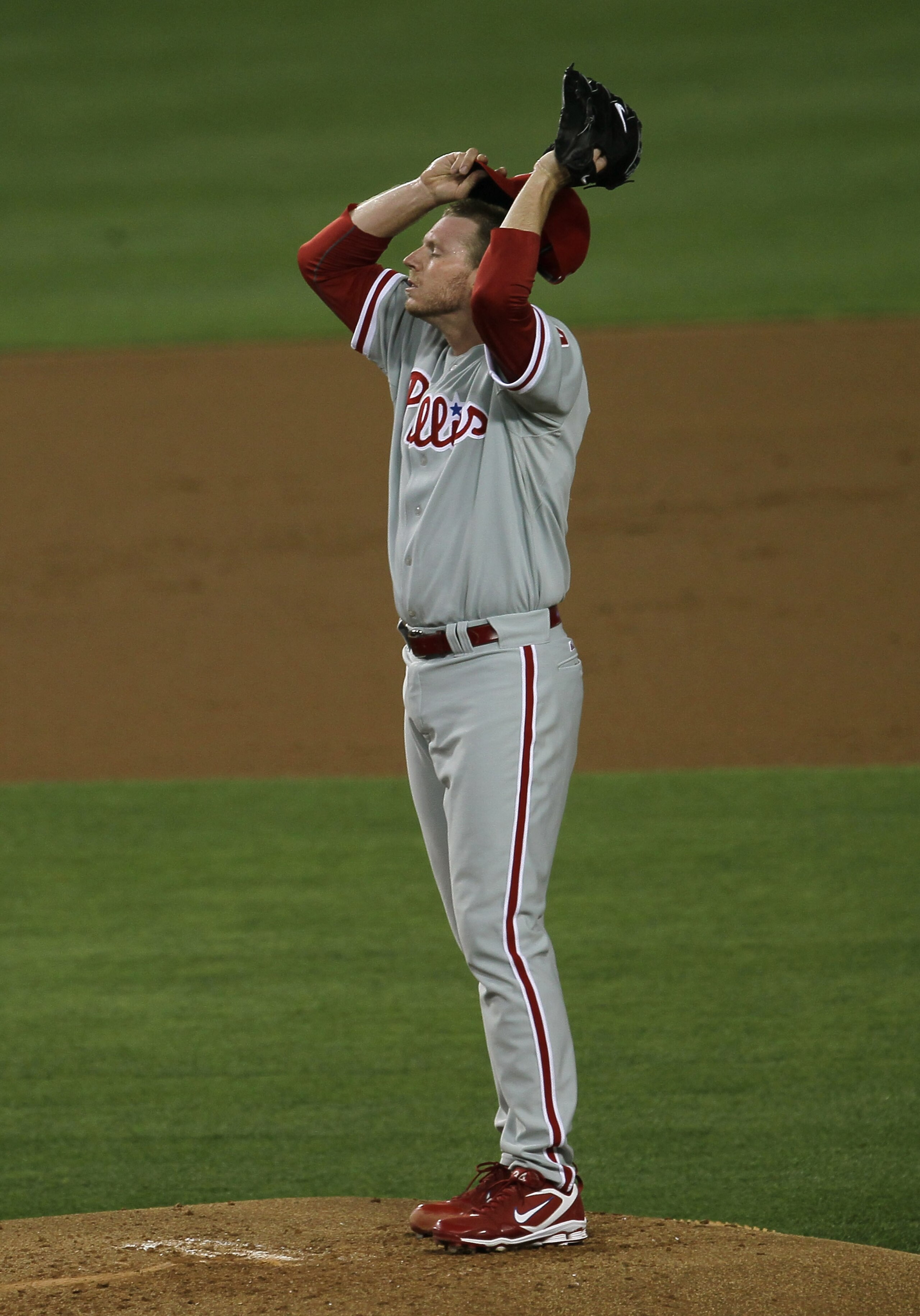 LOS ANGELES, CA - AUGUST 30: Roy Halladay #34 of the Philadelphia Phillies reacts on the mound in the game against the Los Angeles Dodgers on August 30, 2010 at Dodger Stadium in Los Angeles, California. (Photo by Stephen Dunn/Getty Images) LOS ANGELES, CA - AUGUST 30: Roy Halladay #34 of the Philadelphia Phillies reacts on the mound in the game against the Los Angeles Dodgers on August 30, 2010 at Dodger Stadium in Los Angeles, California. (Photo by Stephen Dunn/Getty Images)