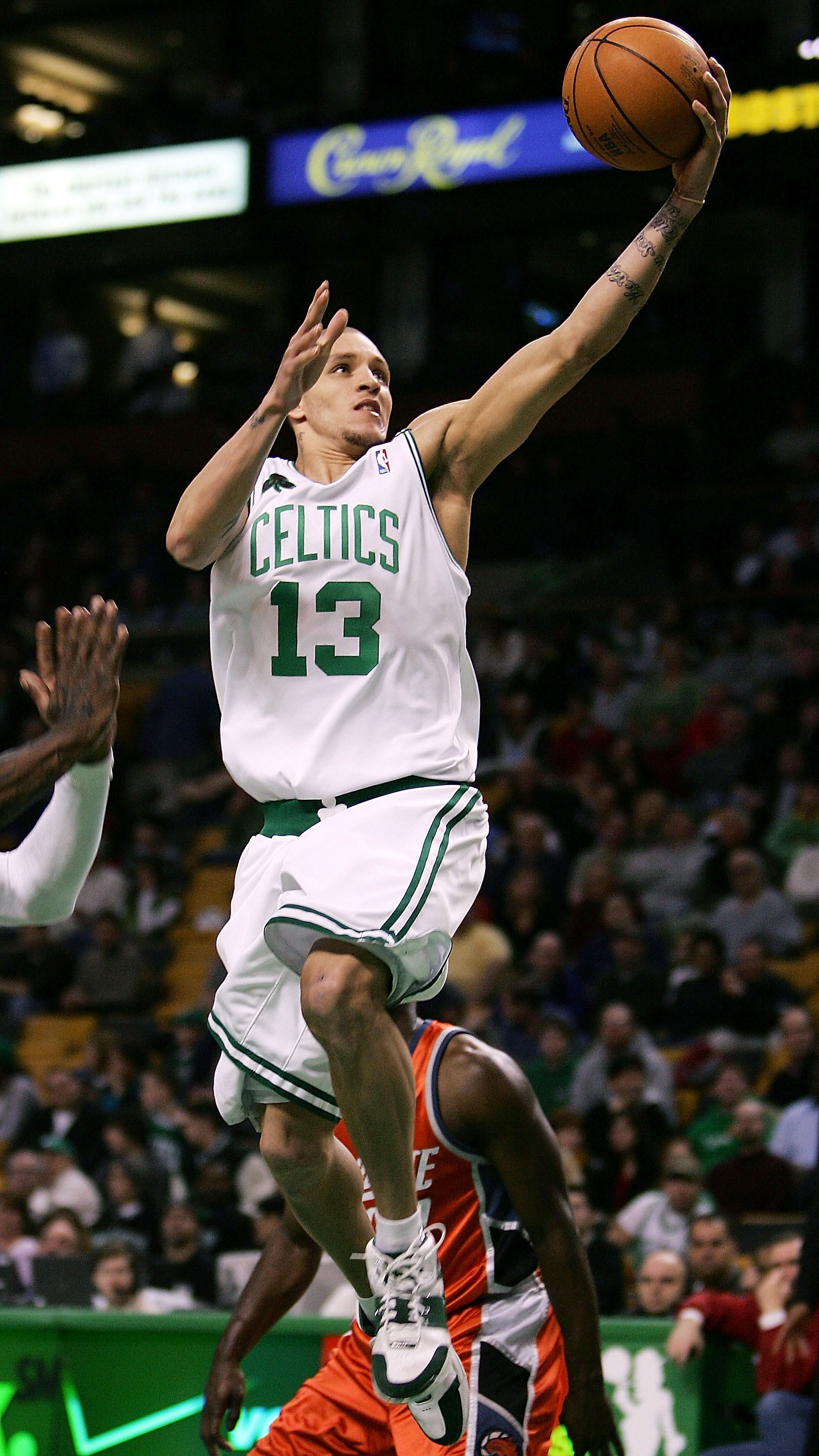 BOSTON - MARCH 21: Delonte West #13 of the Boston Celtics goes up for two against the Charlotte Bobcats on March 21, 2007 at the TD Banknorth Garden in Boston, Massachusetts. The Charlotte Bobcats defeated the Boston Celtics 92-84. NOTE TO USER: User exp BOSTON - MARCH 21: Delonte West #13 of the Boston Celtics goes up for two against the Charlotte Bobcats on March 21, 2007 at the TD Banknorth Garden in Boston, Massachusetts. The Charlotte Bobcats defeated the Boston Celtics 92-84. NOTE TO USER: User exp