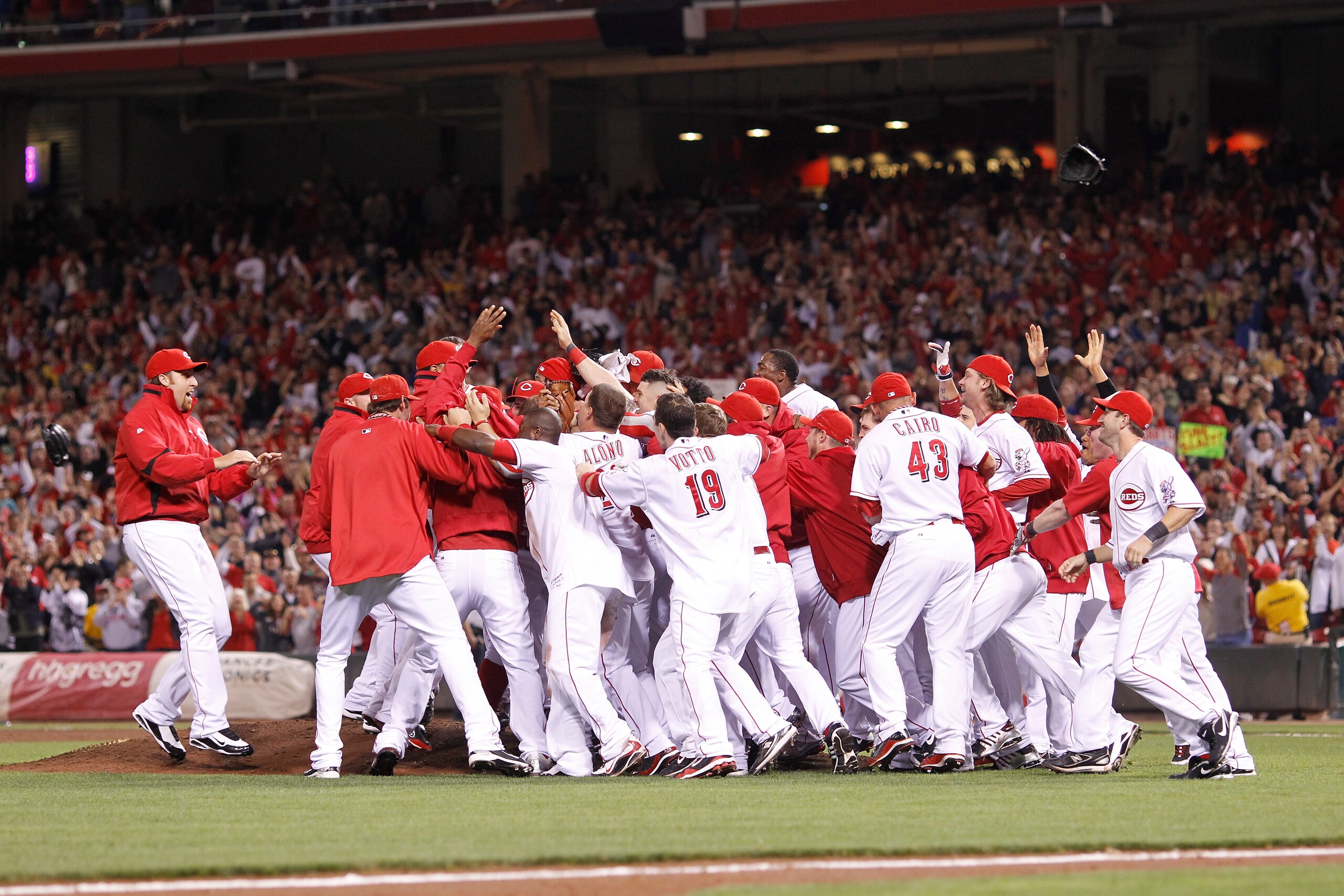 CINCINNATI, OH - SEPTEMBER 28: The Cincinnati Reds celebrate following the game against the Houston Astros at Great American Ball Park on September 28, 2010 in Cincinnati, Ohio. The Reds won 3-2 to clinch the NL Central Division title. (Photo by Joe Robbi CINCINNATI, OH - SEPTEMBER 28: The Cincinnati Reds celebrate following the game against the Houston Astros at Great American Ball Park on September 28, 2010 in Cincinnati, Ohio. The Reds won 3-2 to clinch the NL Central Division title. (Photo by Joe Robbi