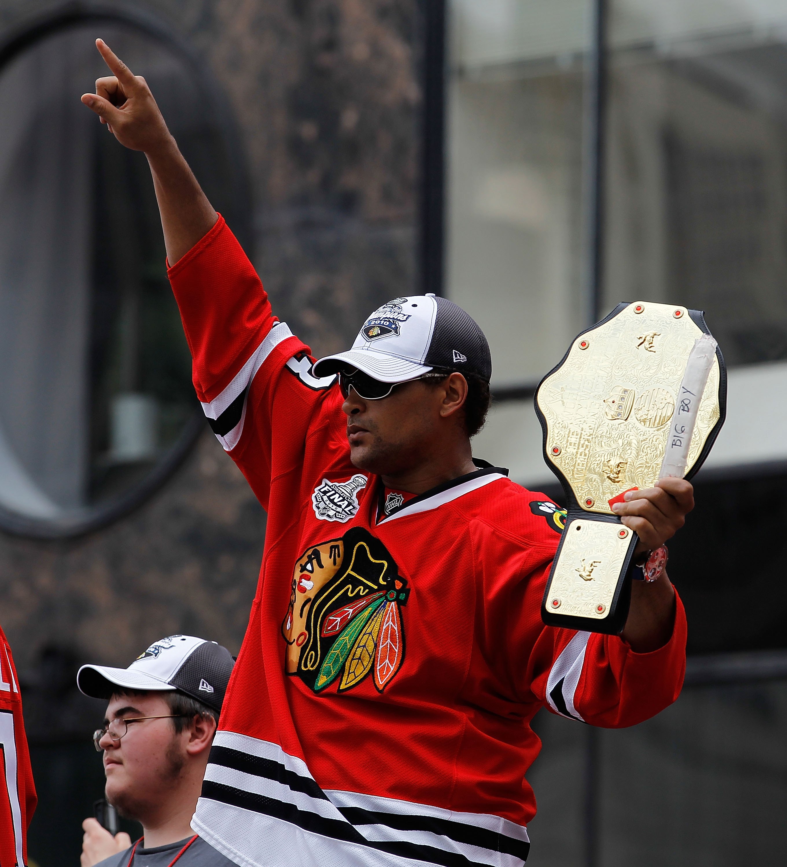 CHICAGO - JUNE 11: Dustin Byfuglien #33 waves the crowd during the Chicago Blackhawks Stanley Cup victory parade and rally on June 11, 2010 in Chicago, Illinois. (Photo by Jonathan Daniel/Getty Images)