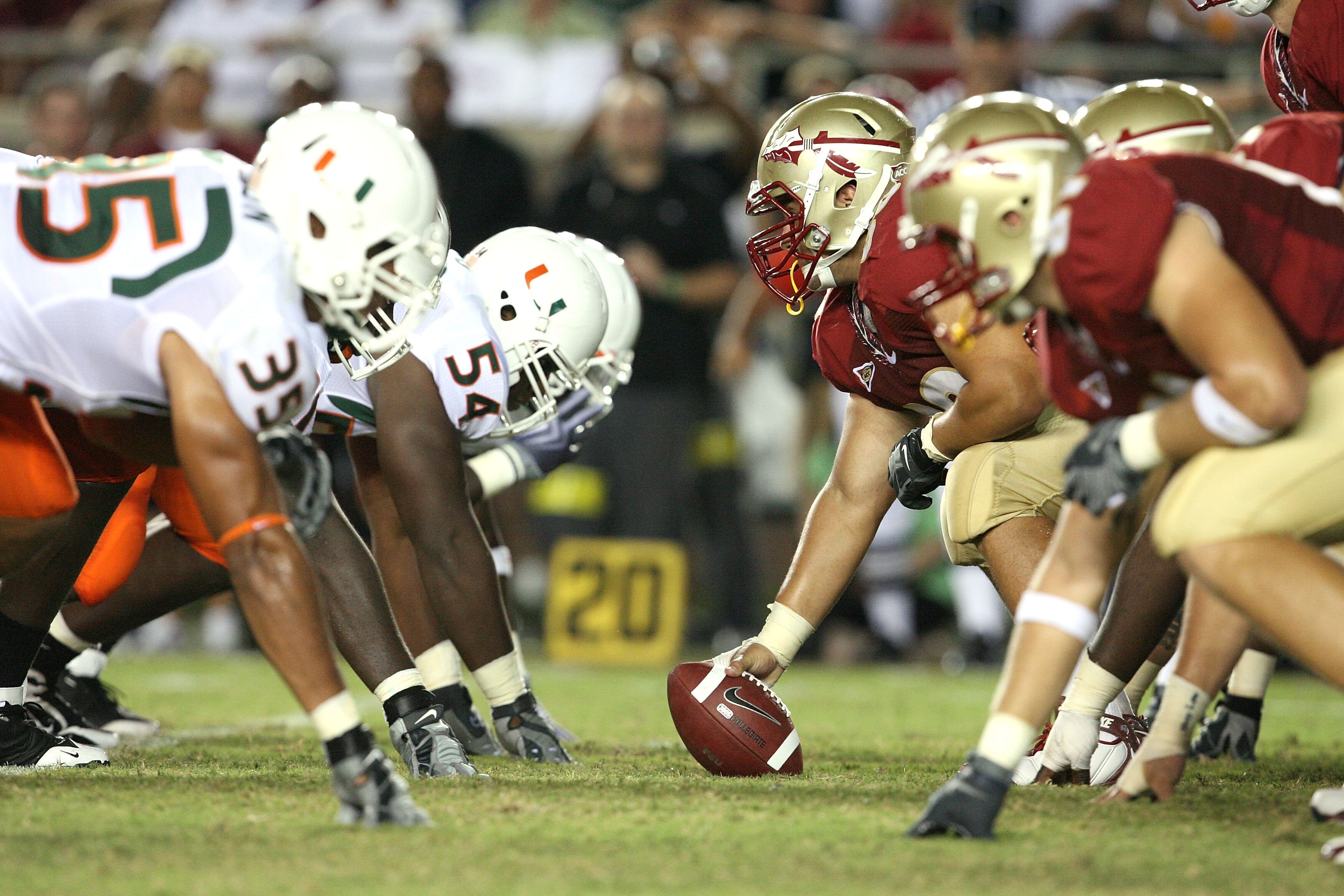 TALLAHASSEE, FL - SEPTEMBER 07: The Miami Hurricanes defense lines up against the offense of the Florida State Seminoles at Doak Campbell Stadium on September 7, 2009 in Tallahassee, Florida. (Photo by Doug Benc/Getty Images) TALLAHASSEE, FL - SEPTEMBER 07: The Miami Hurricanes defense lines up against the offense of the Florida State Seminoles at Doak Campbell Stadium on September 7, 2009 in Tallahassee, Florida. (Photo by Doug Benc/Getty Images)
