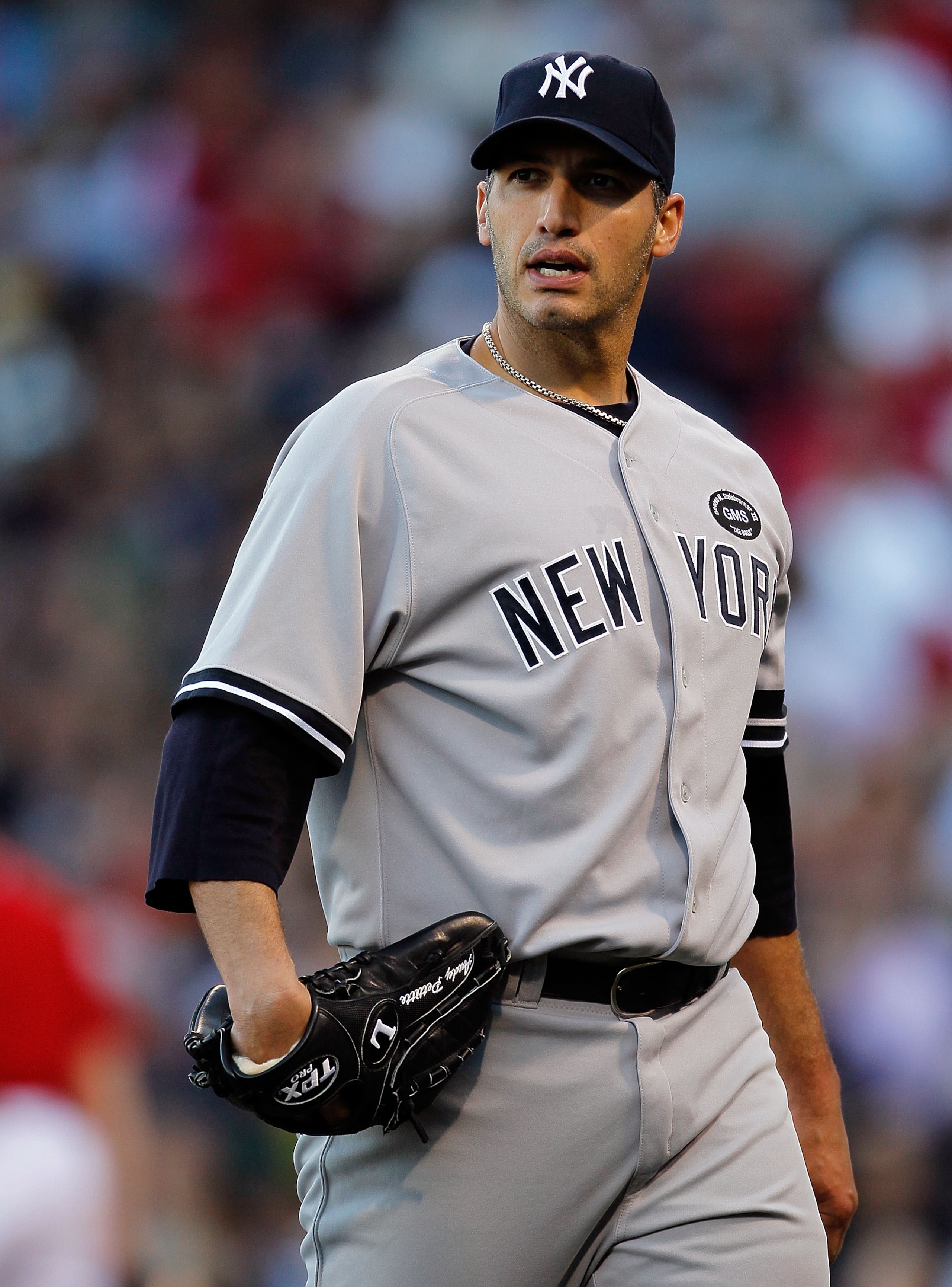 BOSTON - OCTOBER 2:  Andy Pettitte #46 of the New York Yankees reacts during the first game of a doubleheader against the Boston Red Sox at Fenway Park October 2, 2010 in Boston, Massachusetts. (Photo by Jim Rogash/Getty Images)